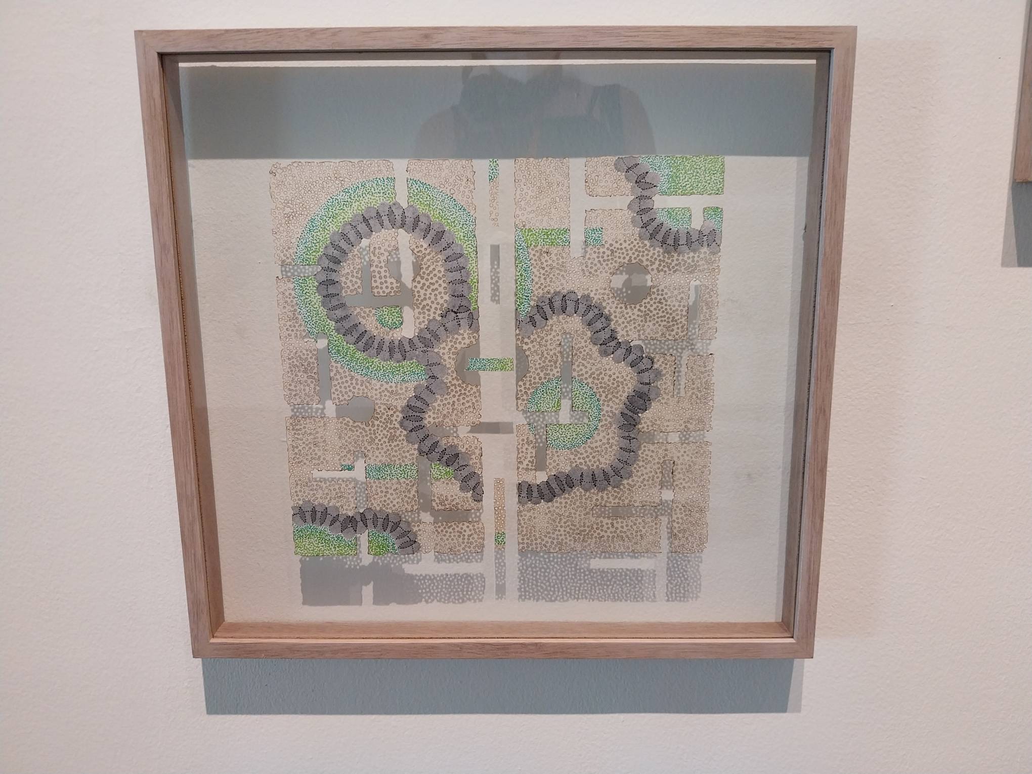 One of the works by Julieanne Ng, framed. Photo by Elle Yap.