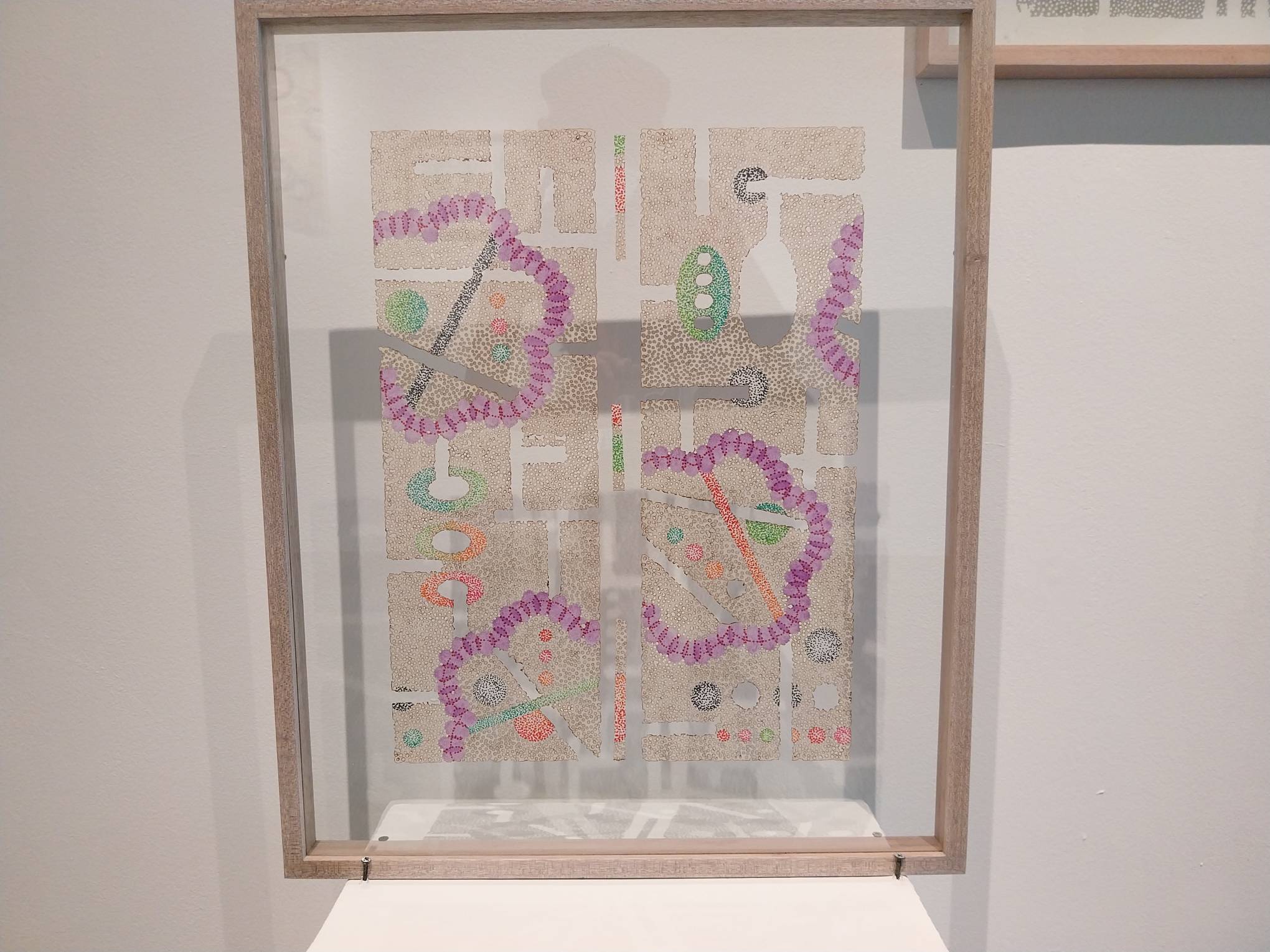 One of the works by Julieanne Ng, standing in a transparent frame. Photo by Elle Yap.