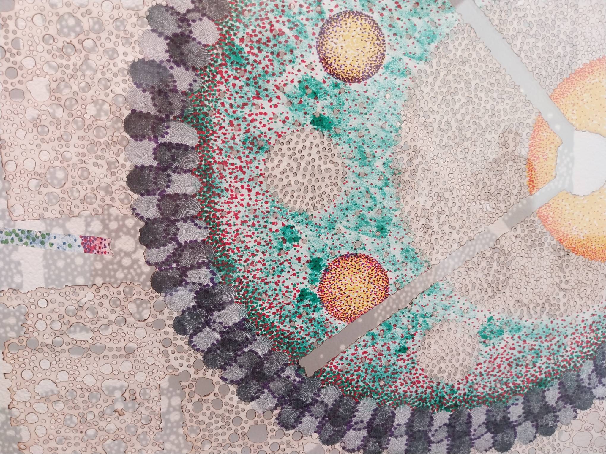 Black fingerprints next to multicolored dots. Photo by Elle Yap.