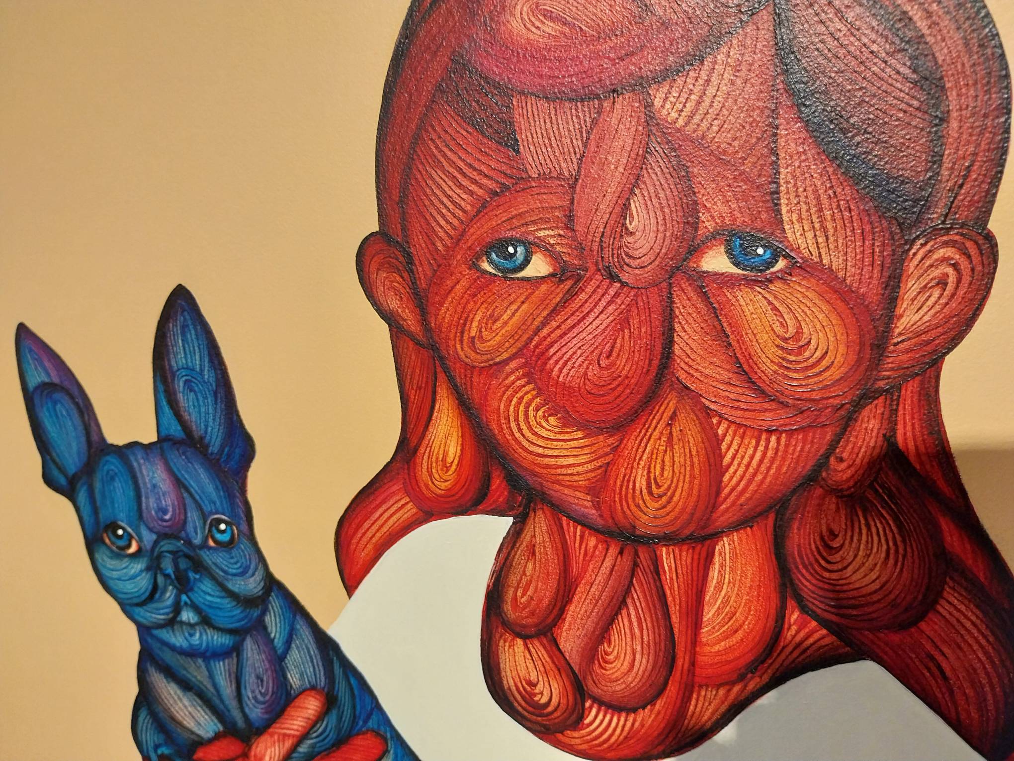 A close-up on the child and their blue dog. Photo by Elle Yap.