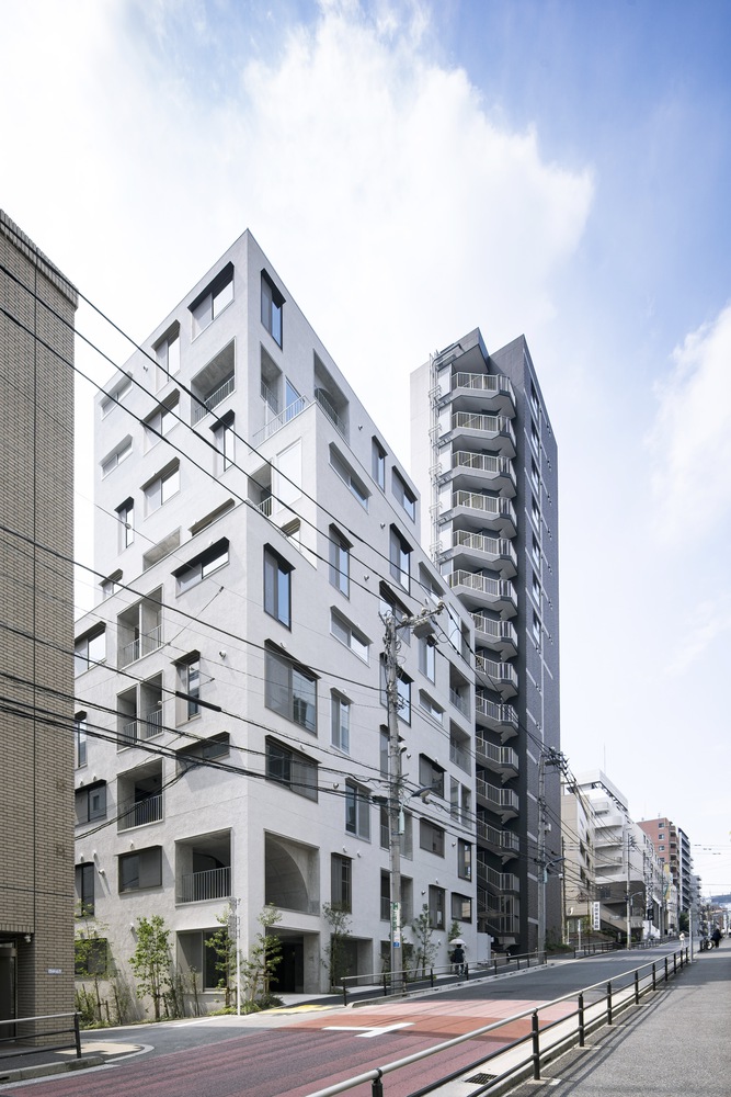 Exterior of the apartment complex. Photo by Masao Nishikawa.