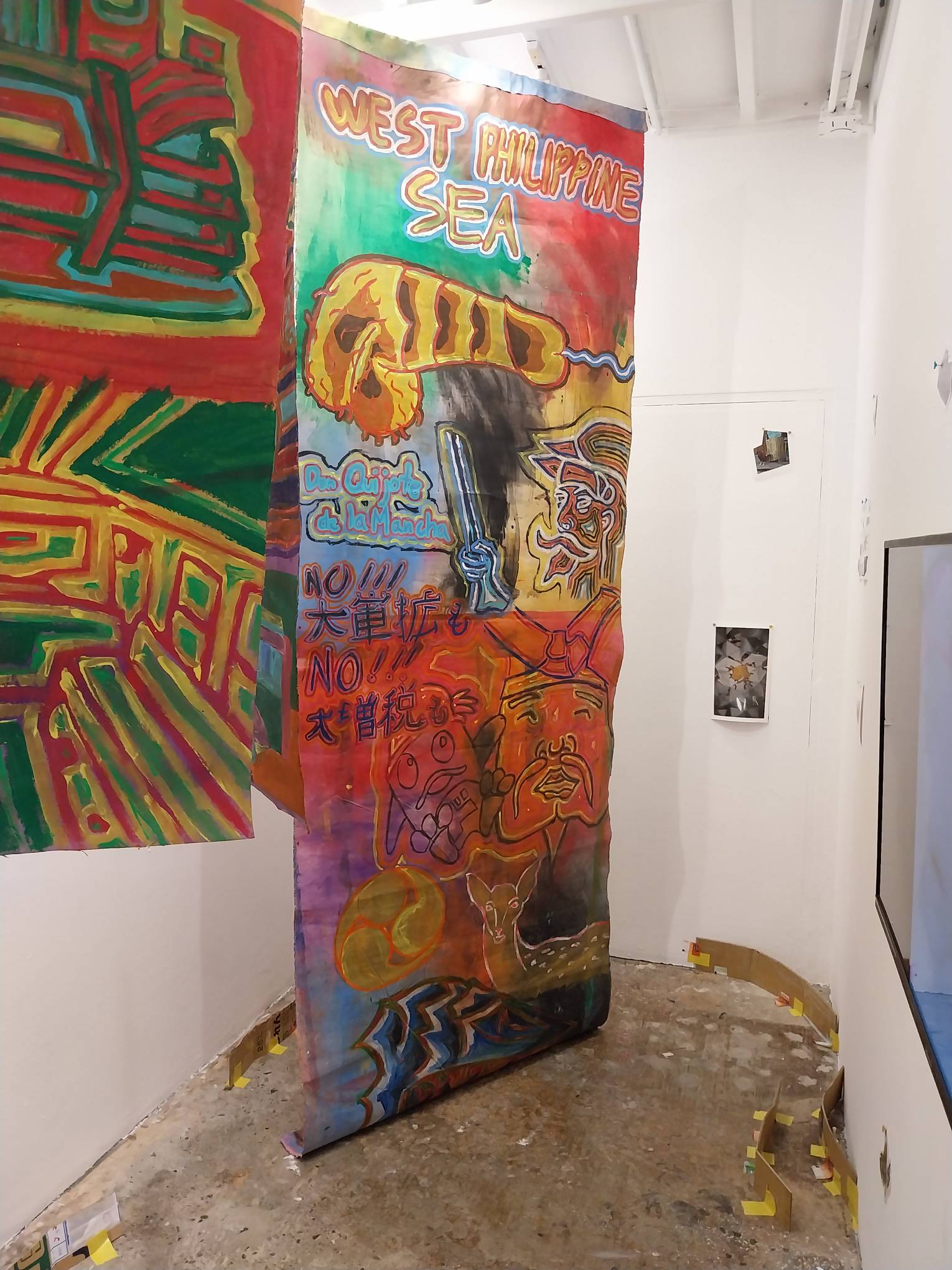 One of the banners for Gerome Soriano's exhibit. Photo by Elle Yap.