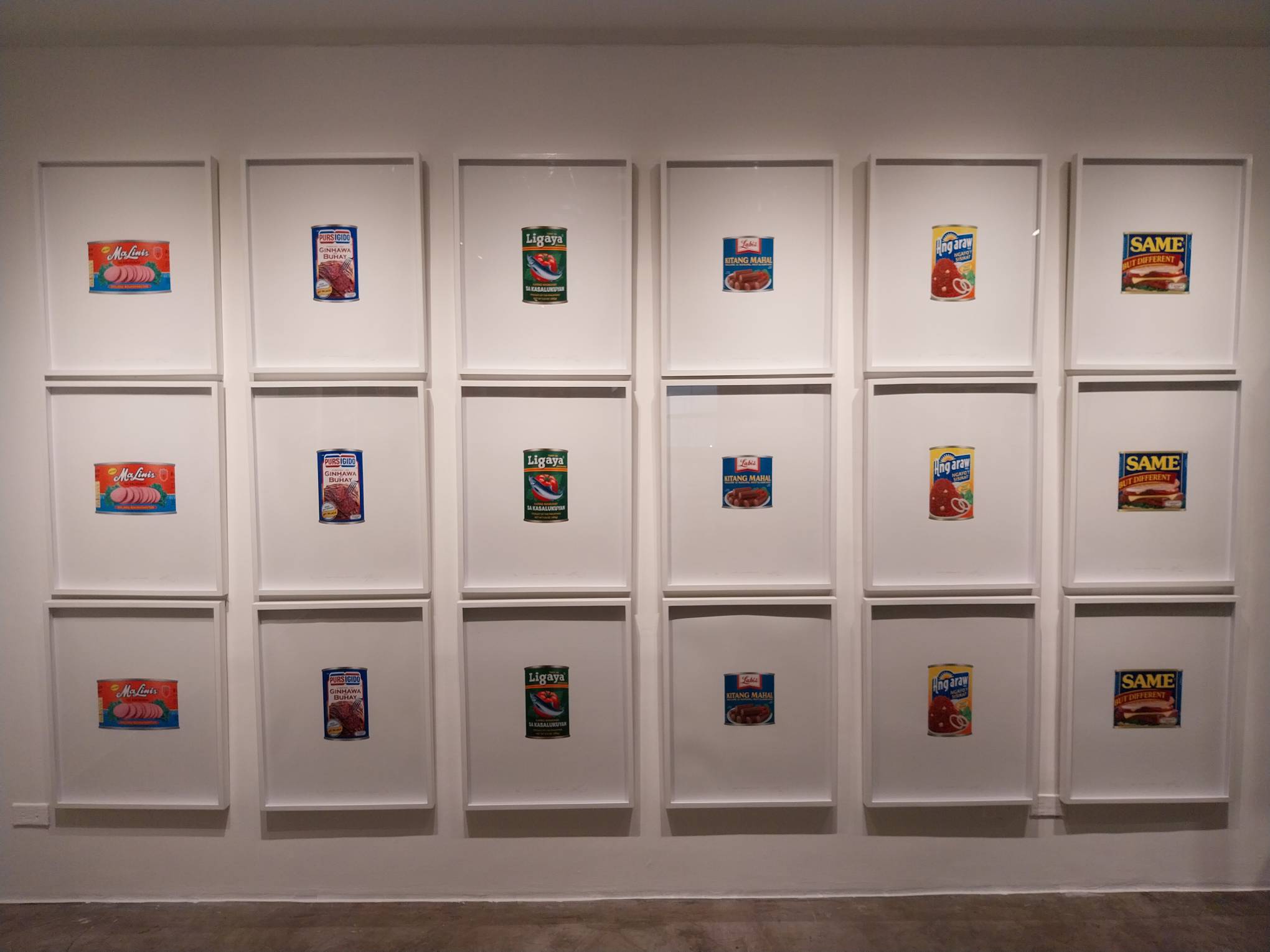 A wall of the brand parodies in a Pop Art ordered style. Photo by Elle Yap.