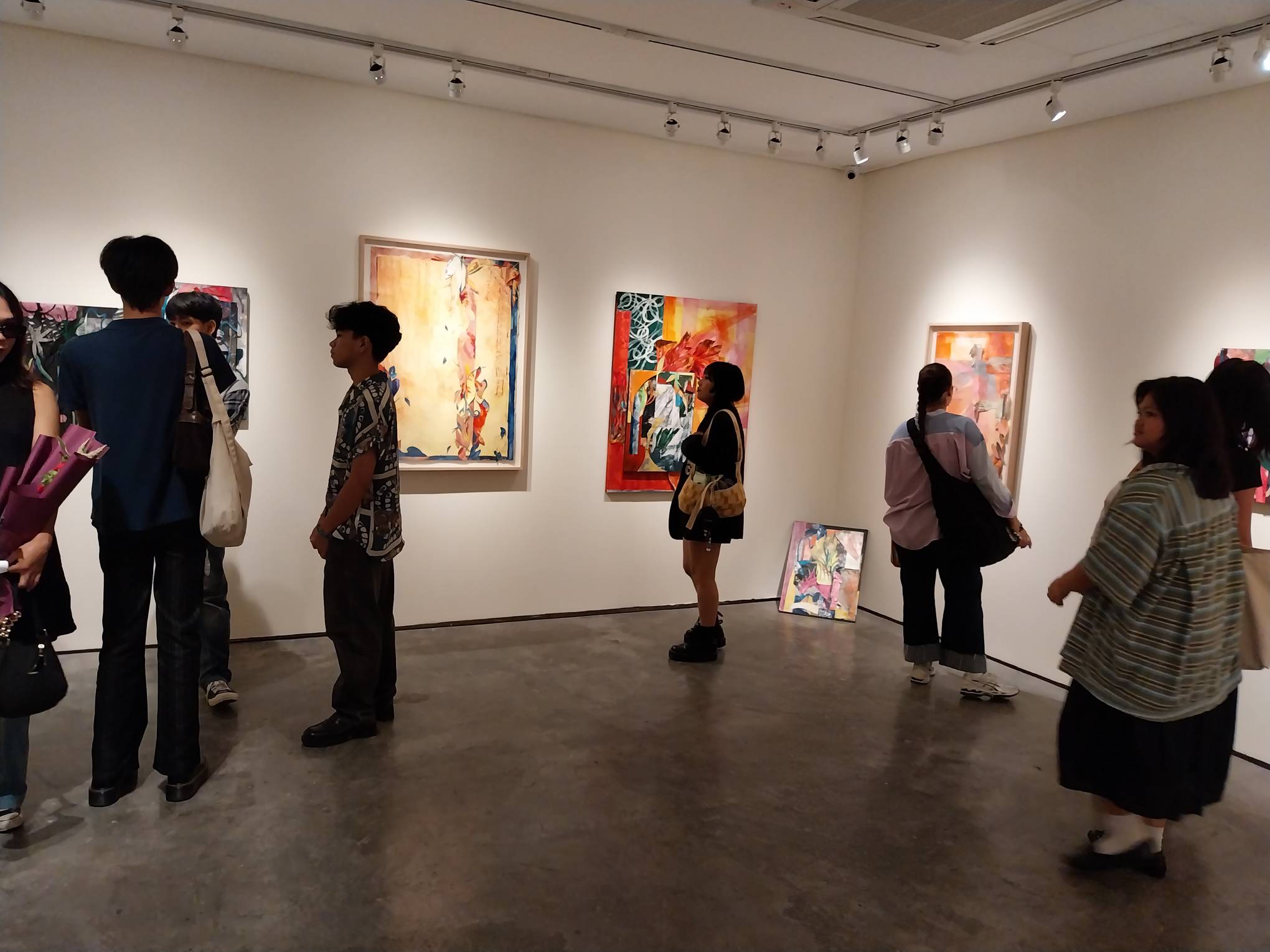 The exhibit's crowds during opening night. Photo by Elle Yap.
