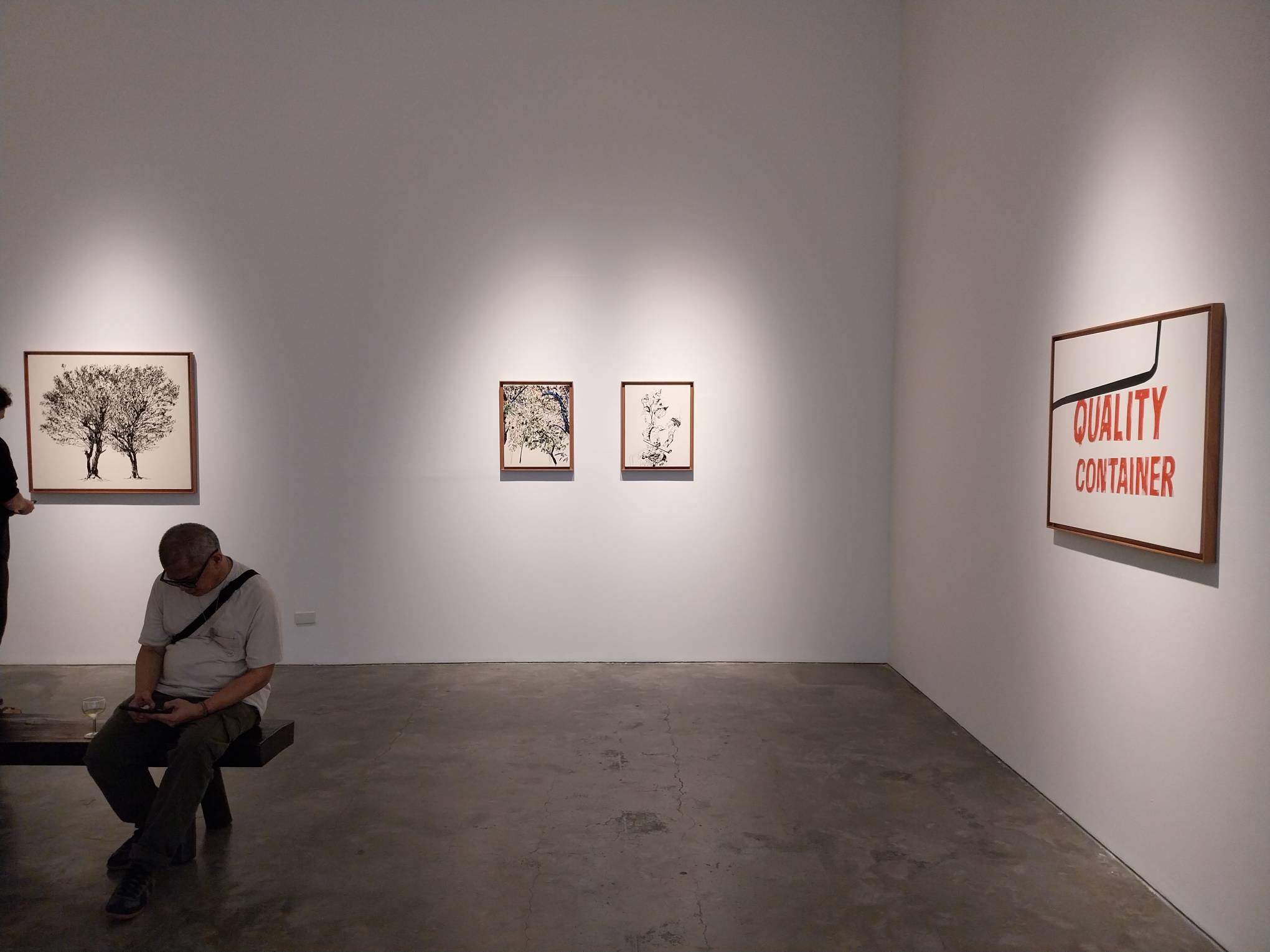 Visitors attending the exhibit. Photo by Elle Yap.