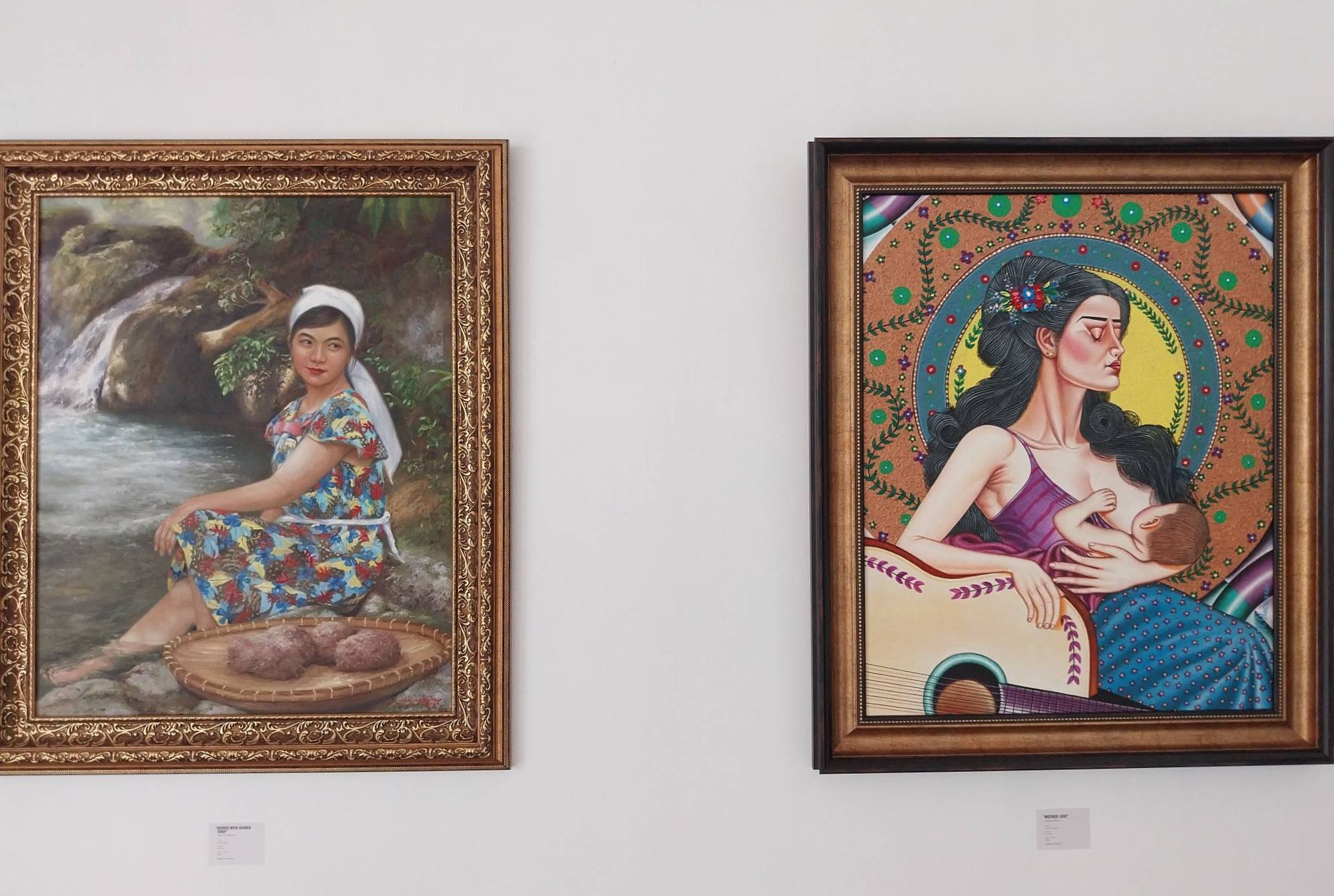 "Maiden with the Sacred Crop" by Victor Kim Naquila (left) and "Mother Love" by Medardo Olaco. Photo by Elle Yap.