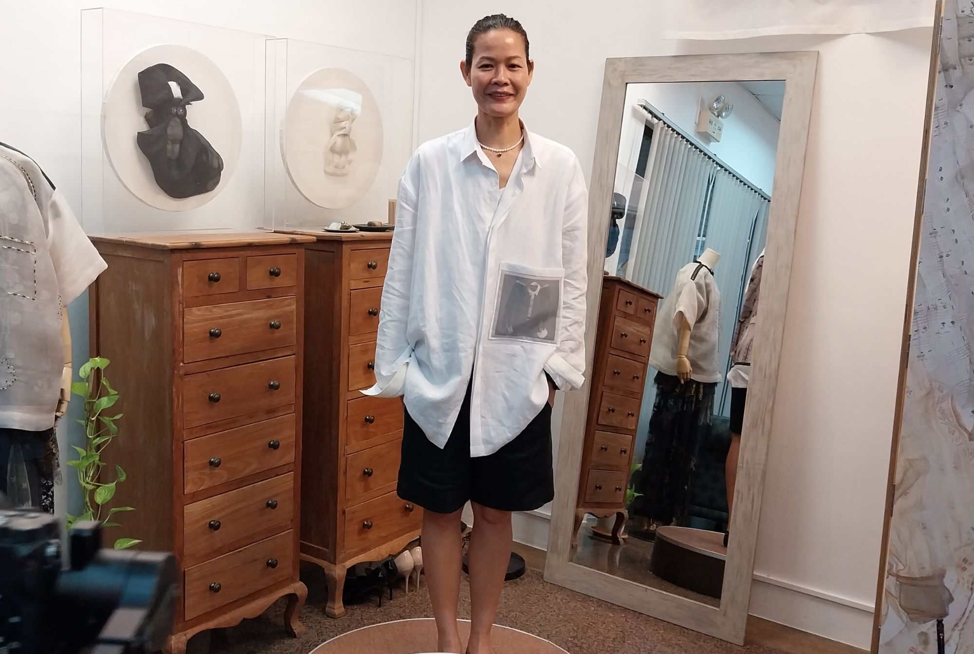 Designer Jo Ann Bitagcol posing in her new showroom. Photo by Elle Yap.