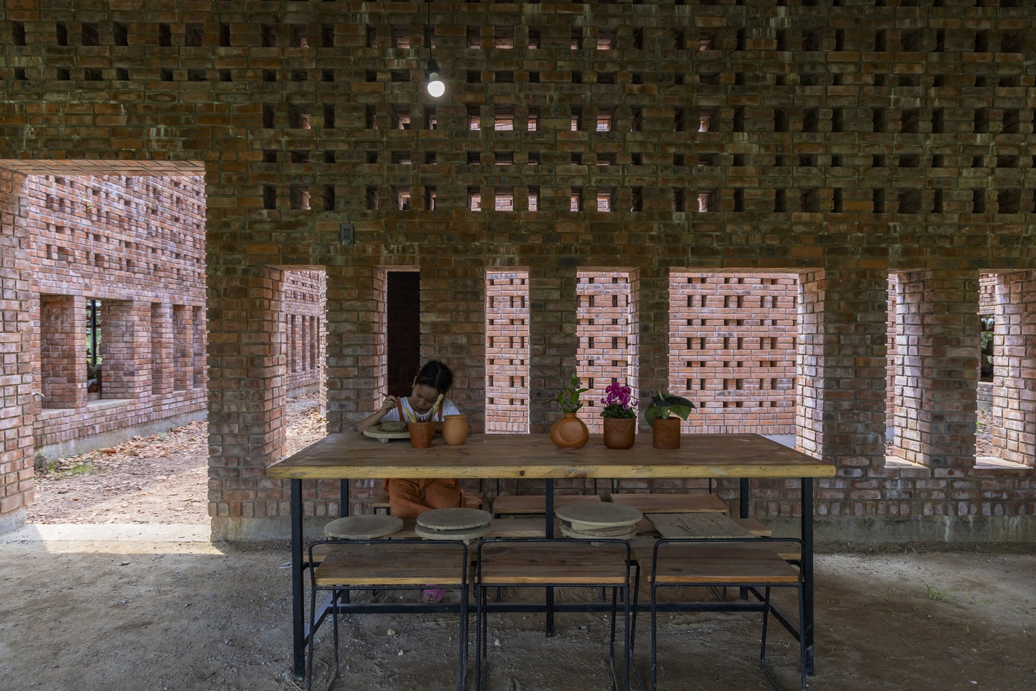 The workshop area for the craftspeople. Photo by Trieu Chien.