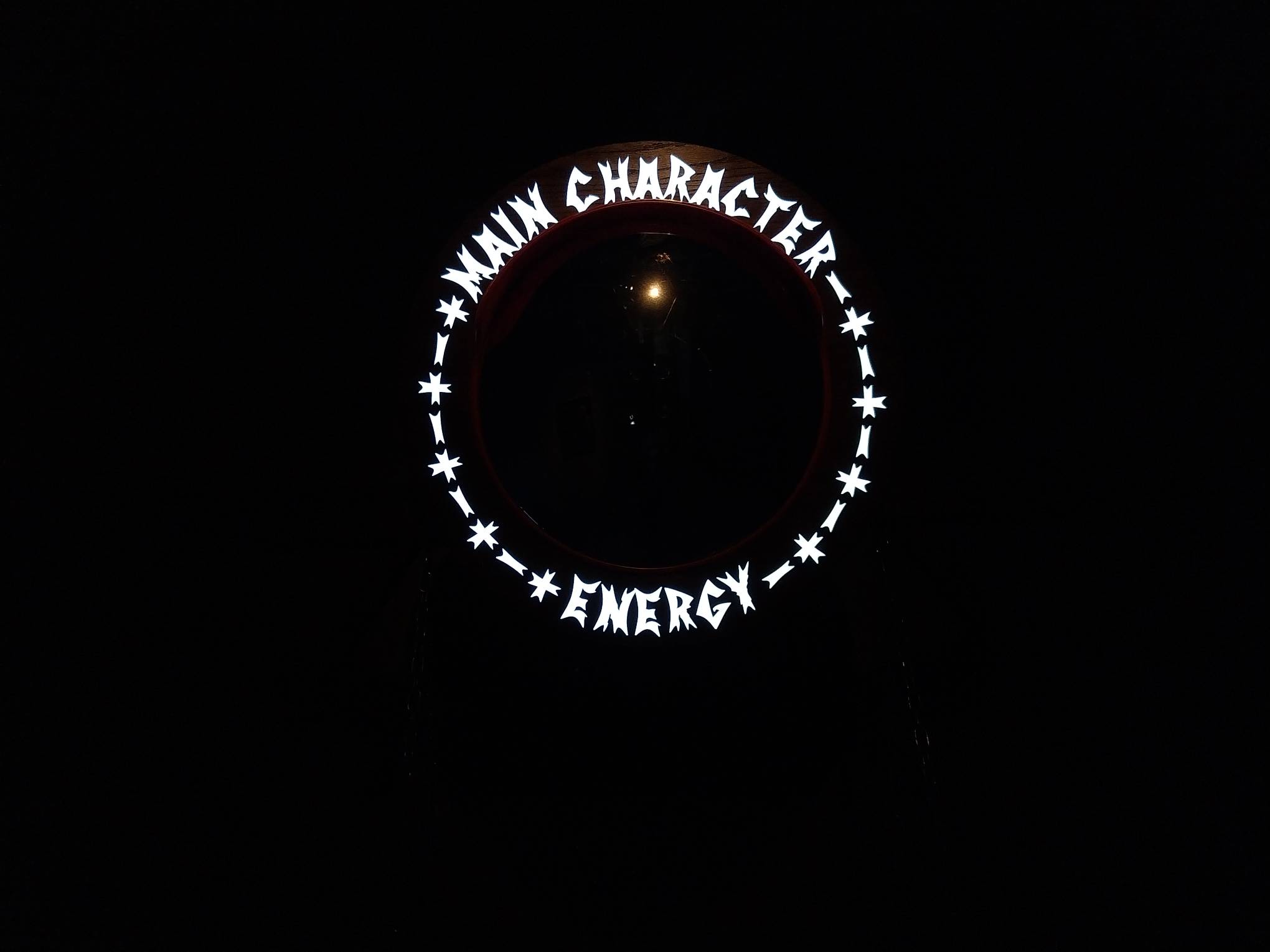 A mirror with "Main Character Energy" written on it. Photo by Elle Yap.