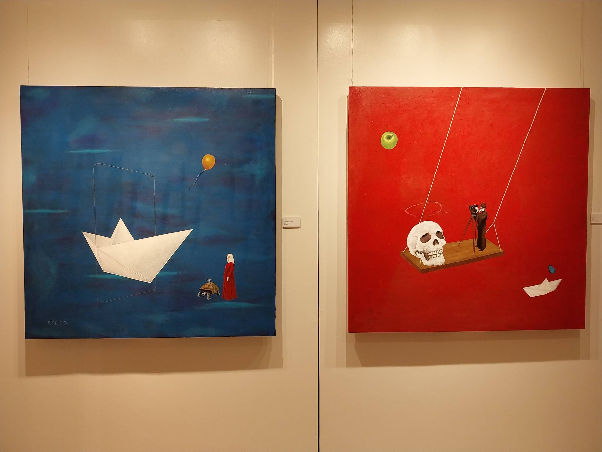 Two paintings by Jethro Jocson. Photo by Elle Yap.
