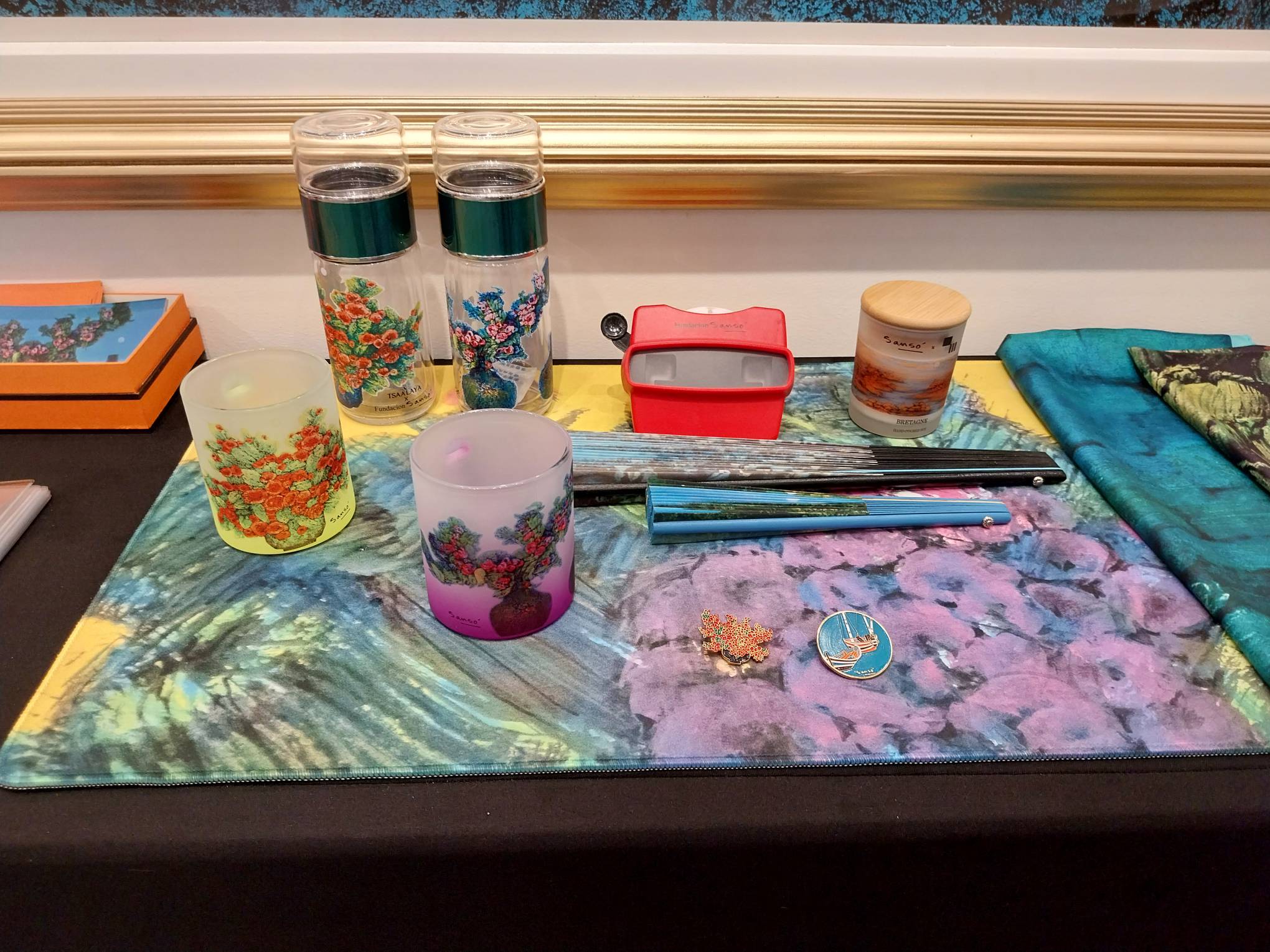 Merchandise with works by Juvenal Sanso. Photo by Elle Yap.