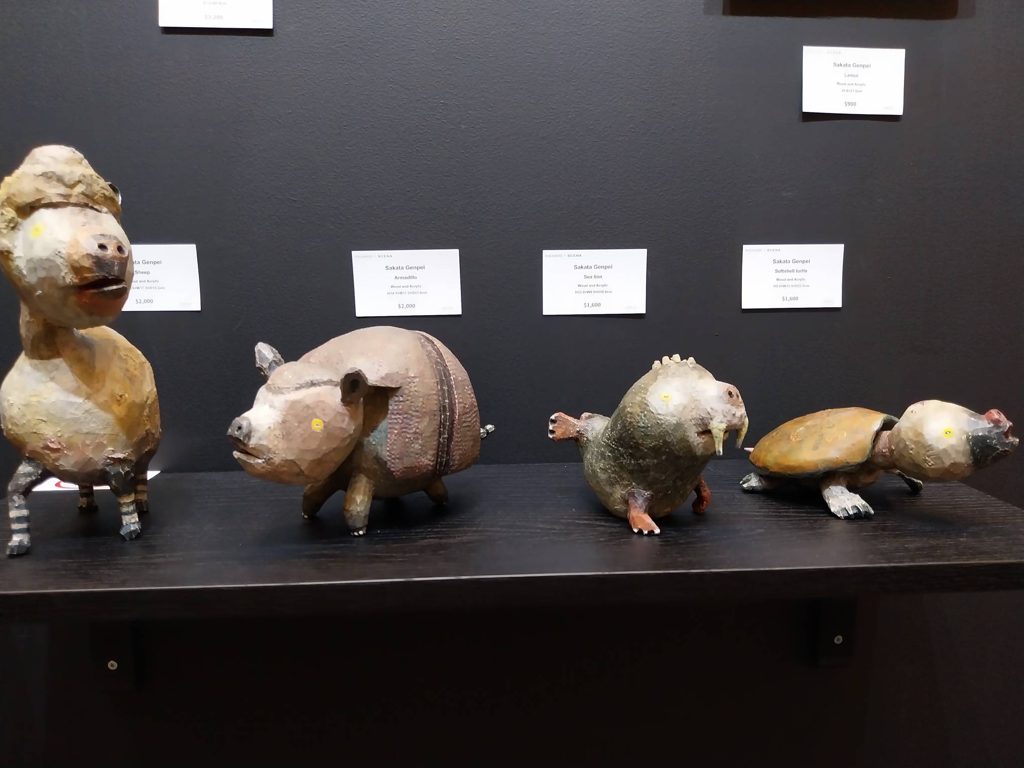 Wooden animal sculptures. Photo by Elle Yap.