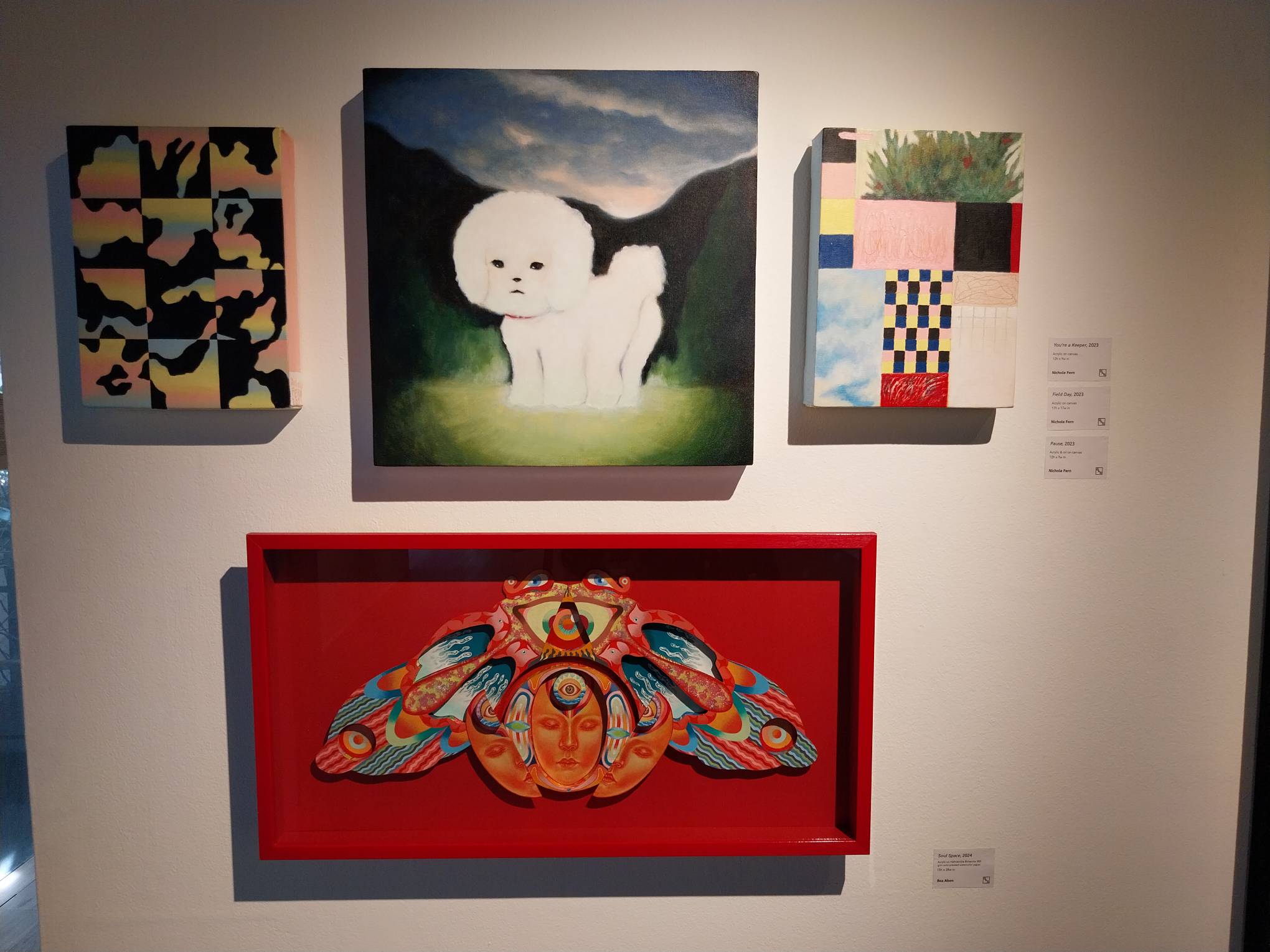 Four works for "Visual Odyssey." Among them is Nichole Fern's "Field Day" and Bea Aben’s “Soul Space.” Photo by Elle Yap.