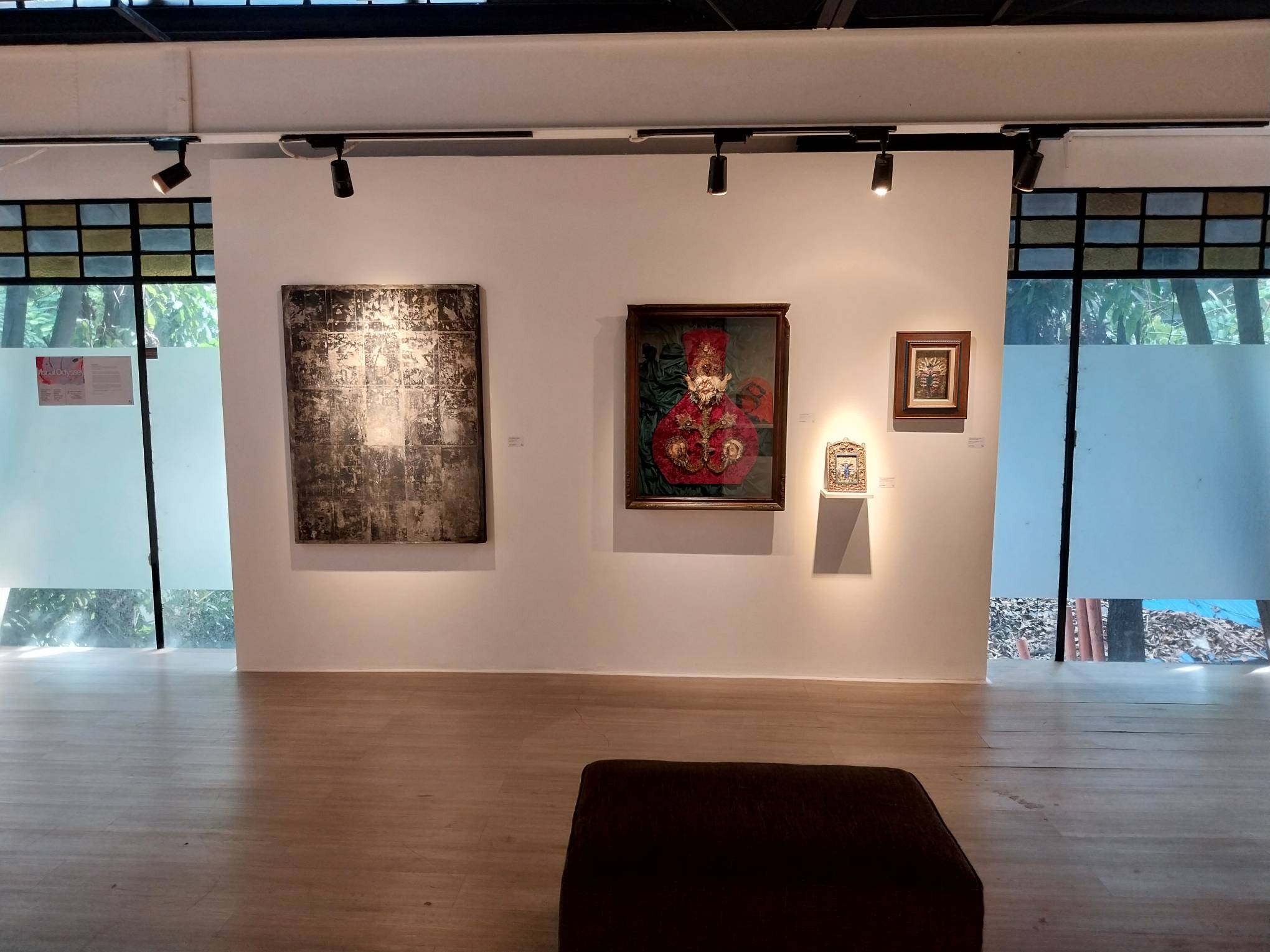 Some of the works in view at Gravity Art Space's "Visual Odyssey" exhibit. Photo by Elle Yap.