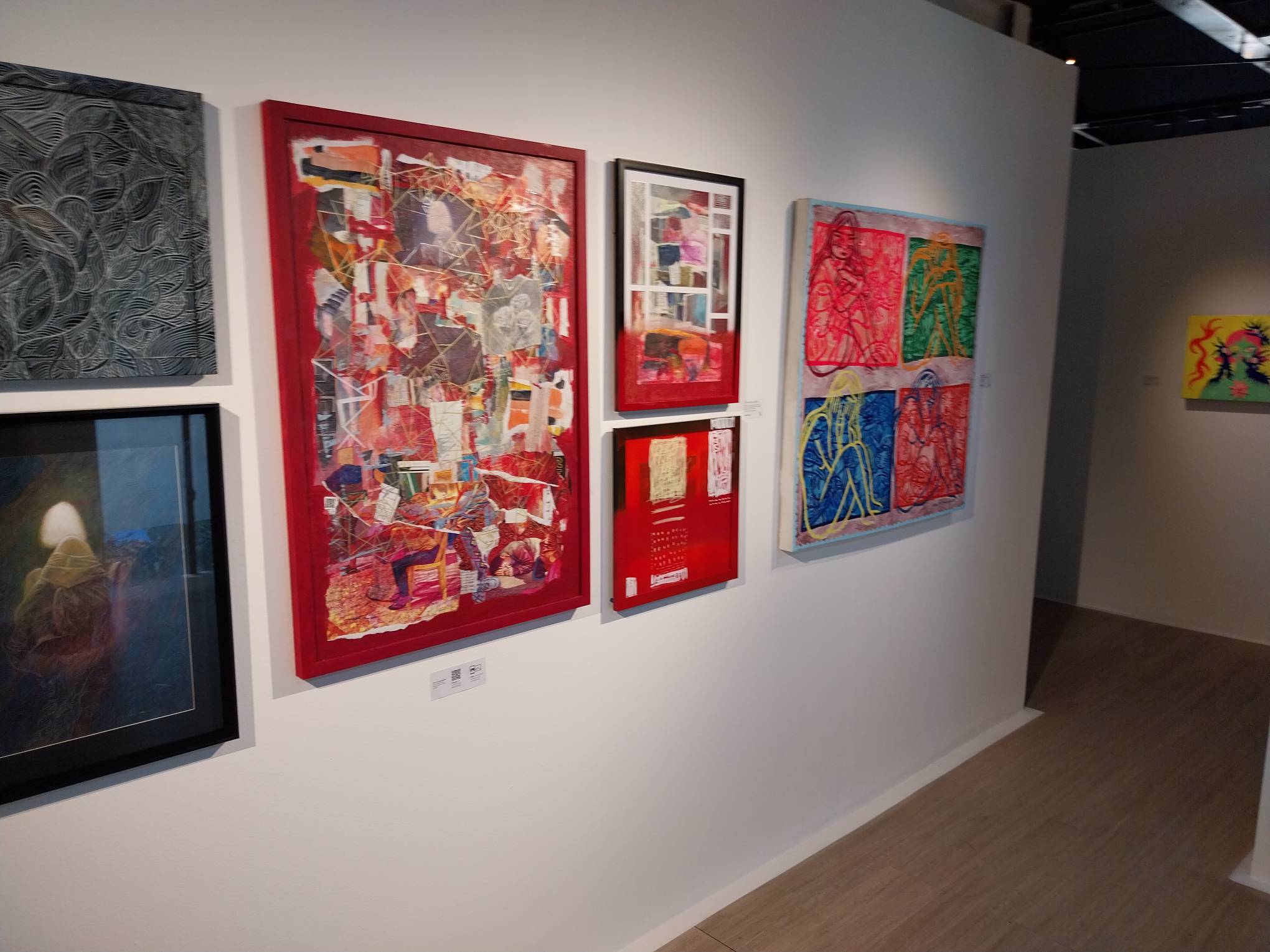 Some of the works in view at Gravity Art Space's "Visual Odyssey" exhibit. Photo by Elle Yap.