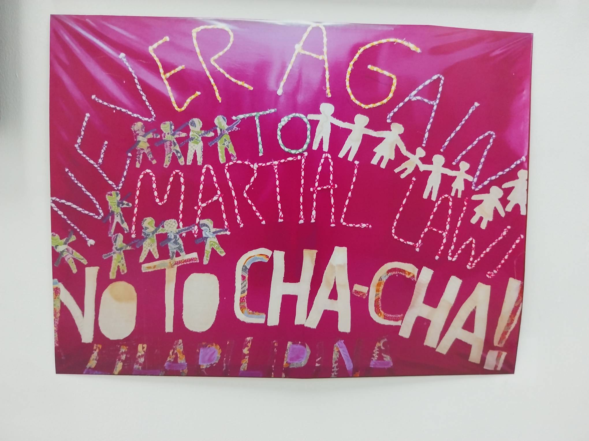 A placard by GABRIELA pushing against Martial Law and charter change. Photo by Elle Yap.