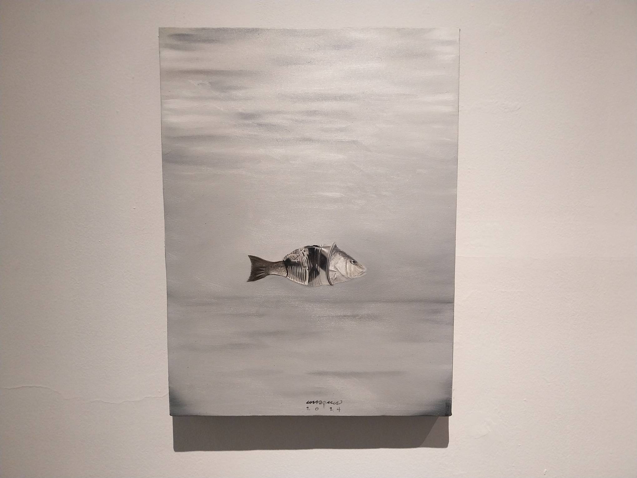 Work by Kiko Marquez depicting a fish trapped in a plastic cup. Photo by Elle Yap.