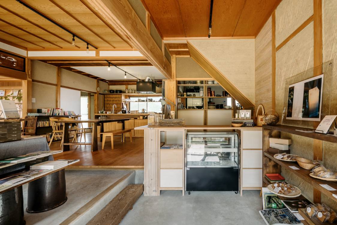 The bookstore interior with the kitchen in view. Photo by Yoshiro Masuda.