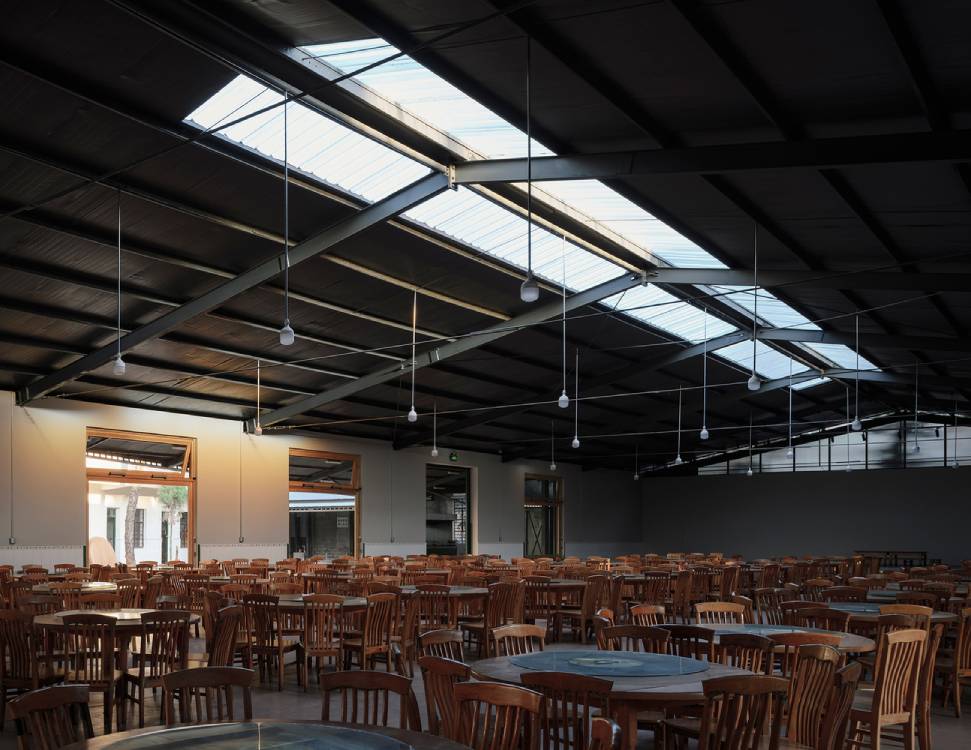 The main community dining hall with the skylight for natural lighting. Photo by Chen Hao.
