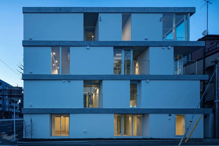Higashi Tamagawa Apartment Complex at night. Photo by Ryogo Utatsu and Kenta Hasegawa.