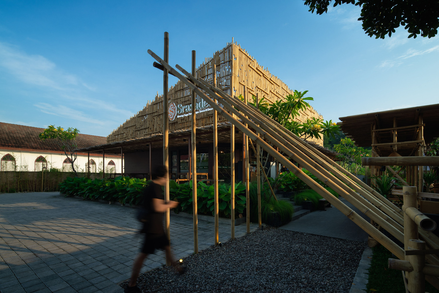 The front of the restaurant with the bamboo trails. Photo by Ukara Studio.