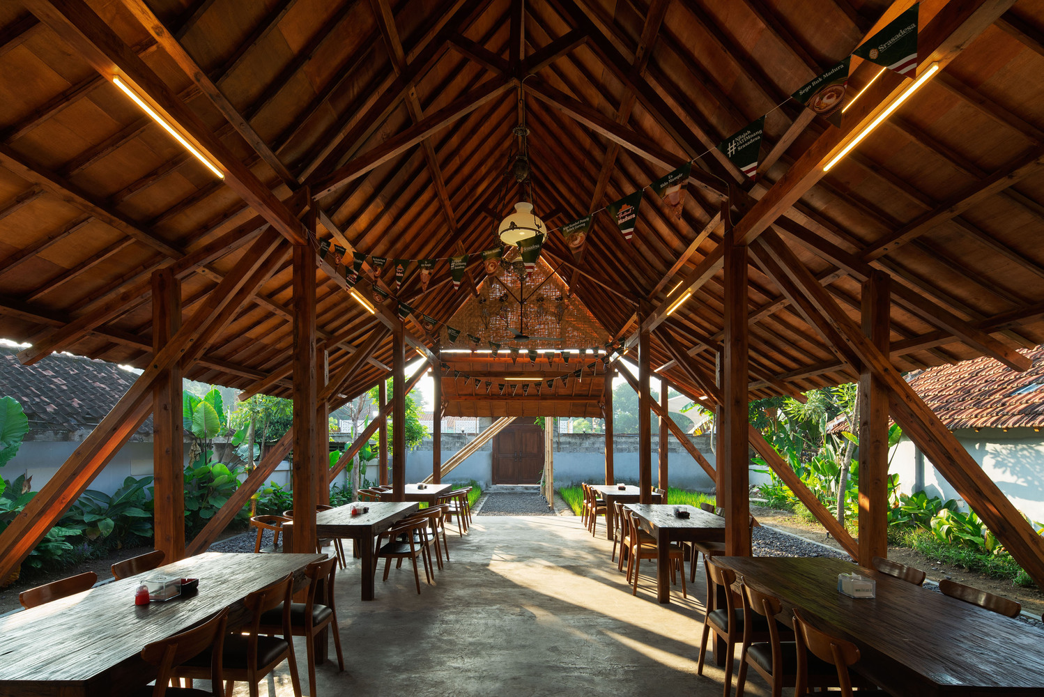 Interior of one of the outdoor dining areas of Srasadesa Restaurant. Photo by Ukara Studio.