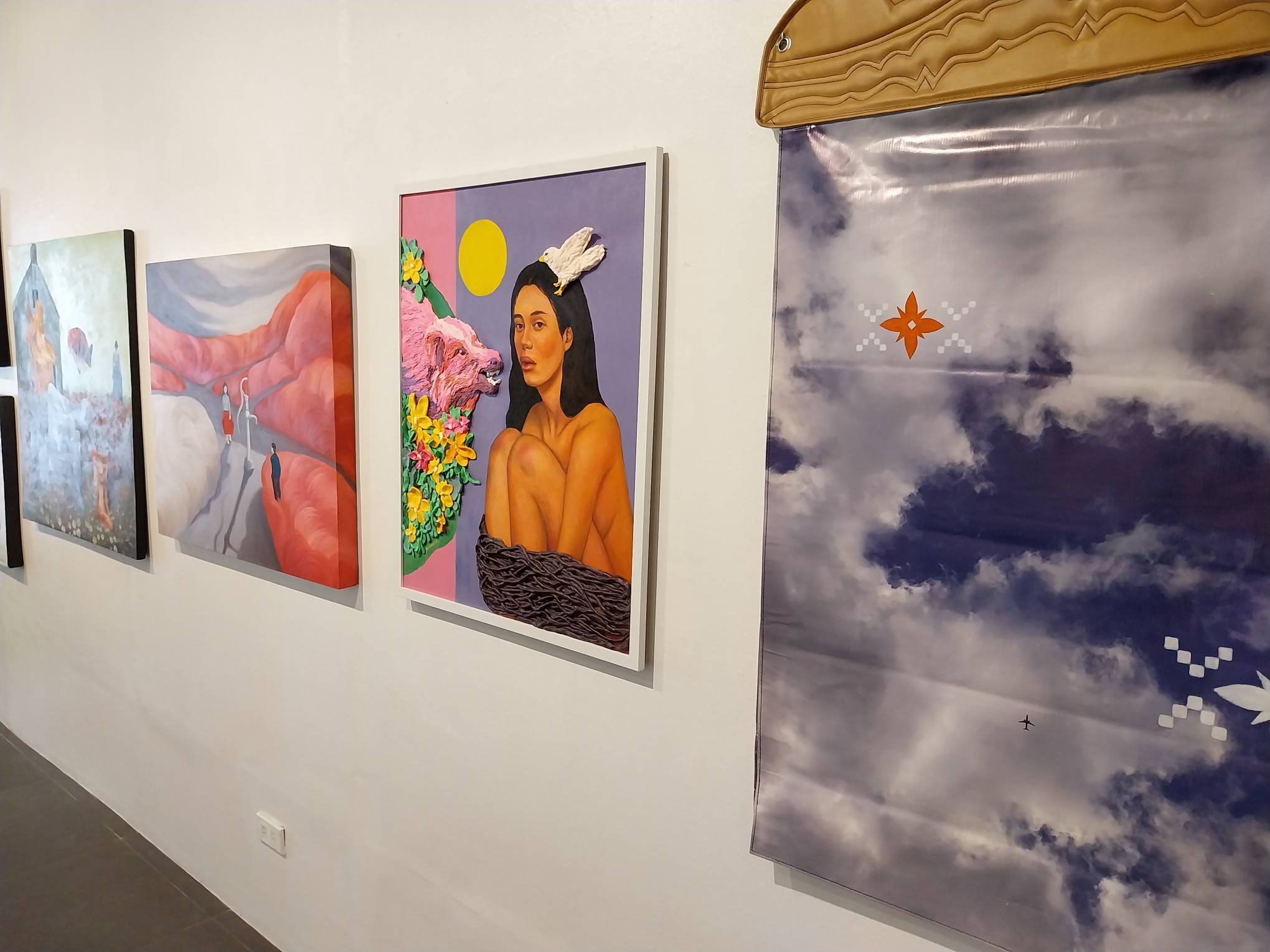 Paintings as shown in Kaida Contemporary's "Sur" exhibit. Photo by Elle Yap.