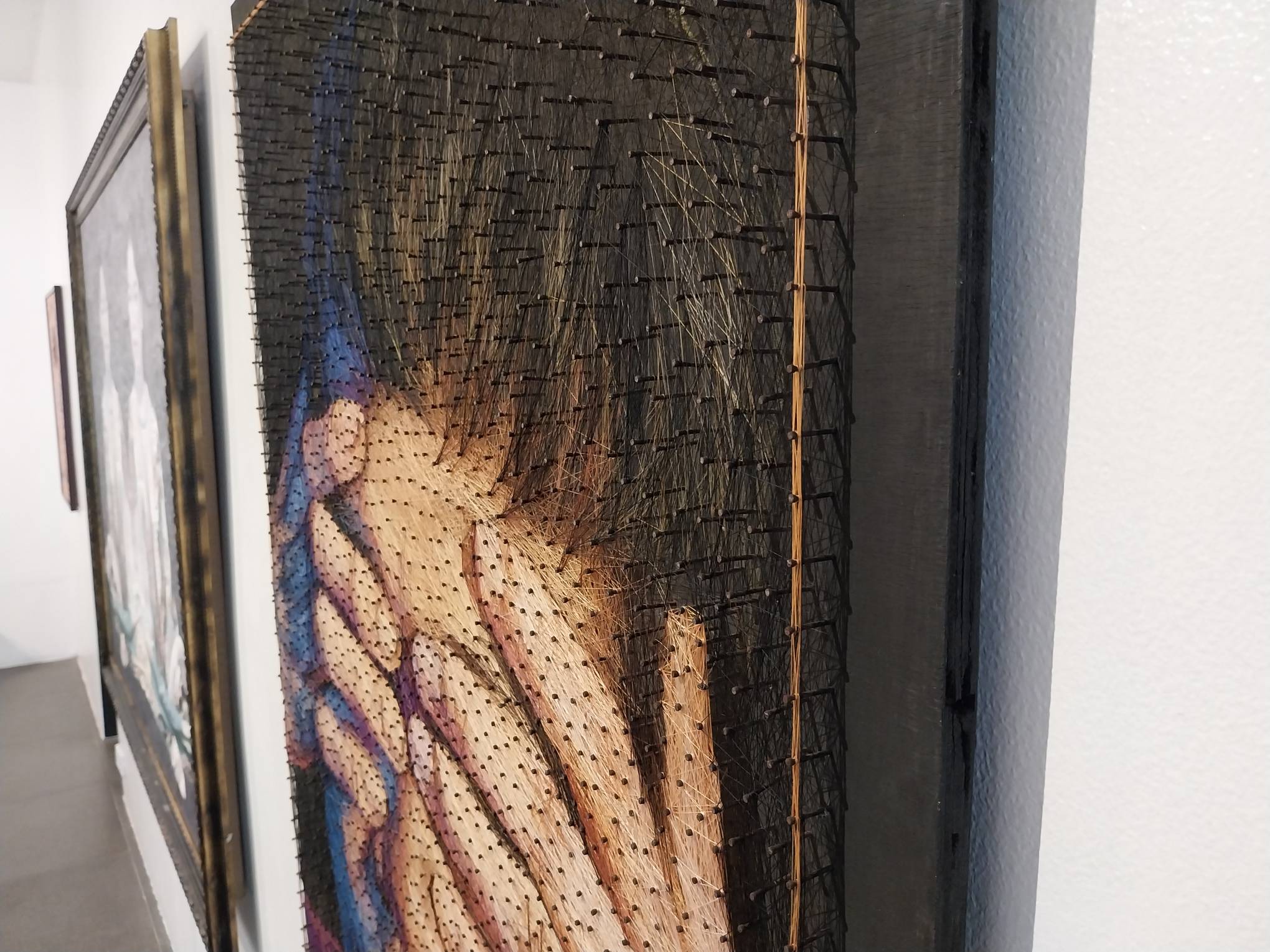 Close-up to Meleksyu's meticulous fabric-work for "Apathy 1," as presented in "Sur." Photo by Elle Yap.