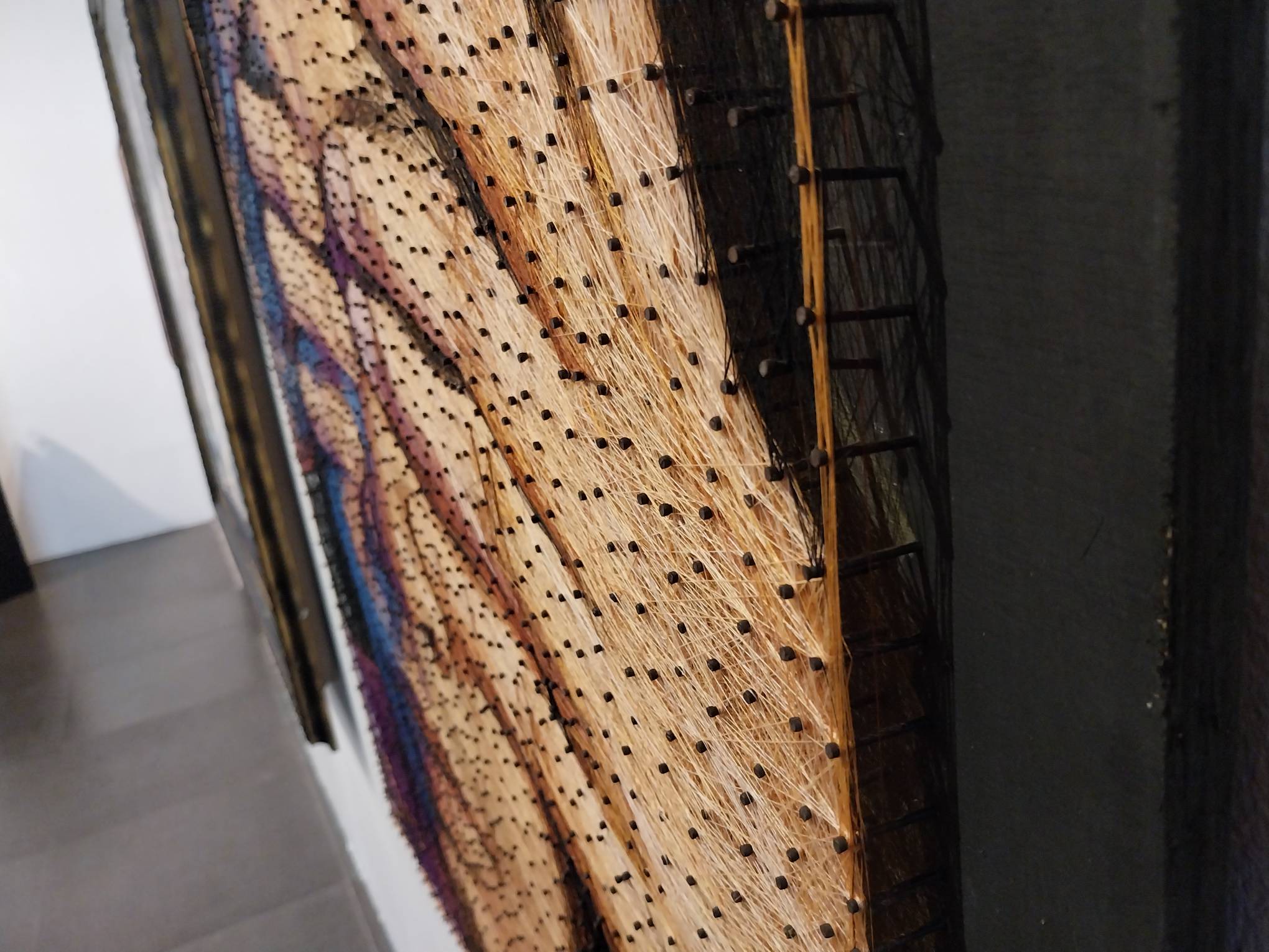 Close-up to Meleksyu's meticulous fabric-work for "Apathy 1," as presented in "Sur." Photo by Elle Yap.