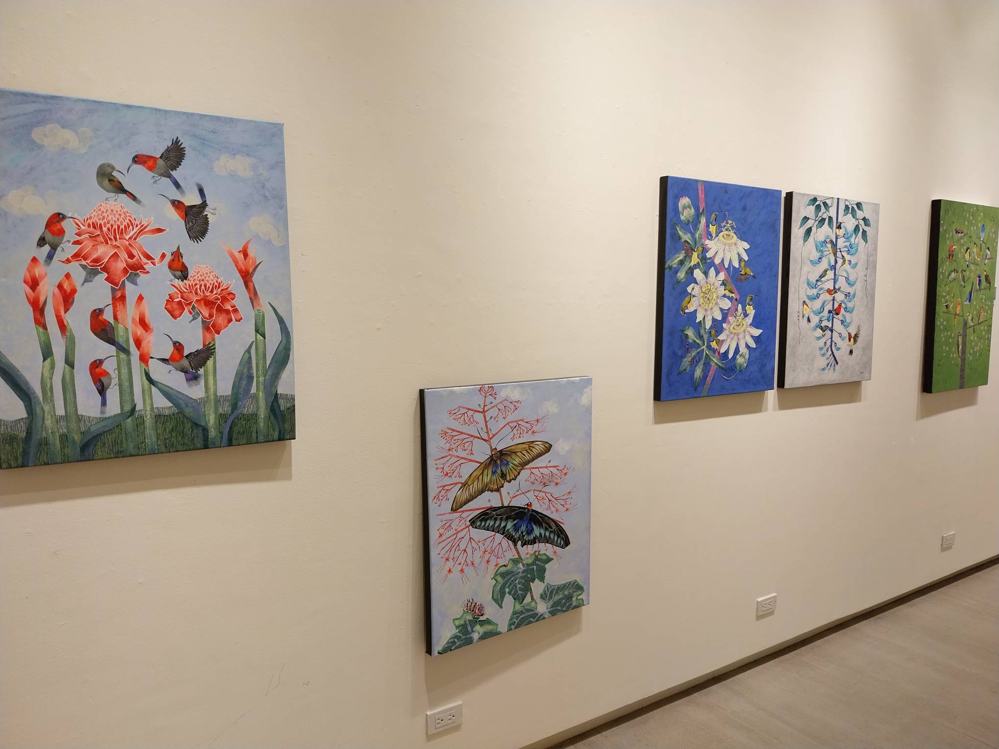 Some of the paintings for the "HImig ng Bahaghari" exhibit showng native birds. Photo by Elle Yap.