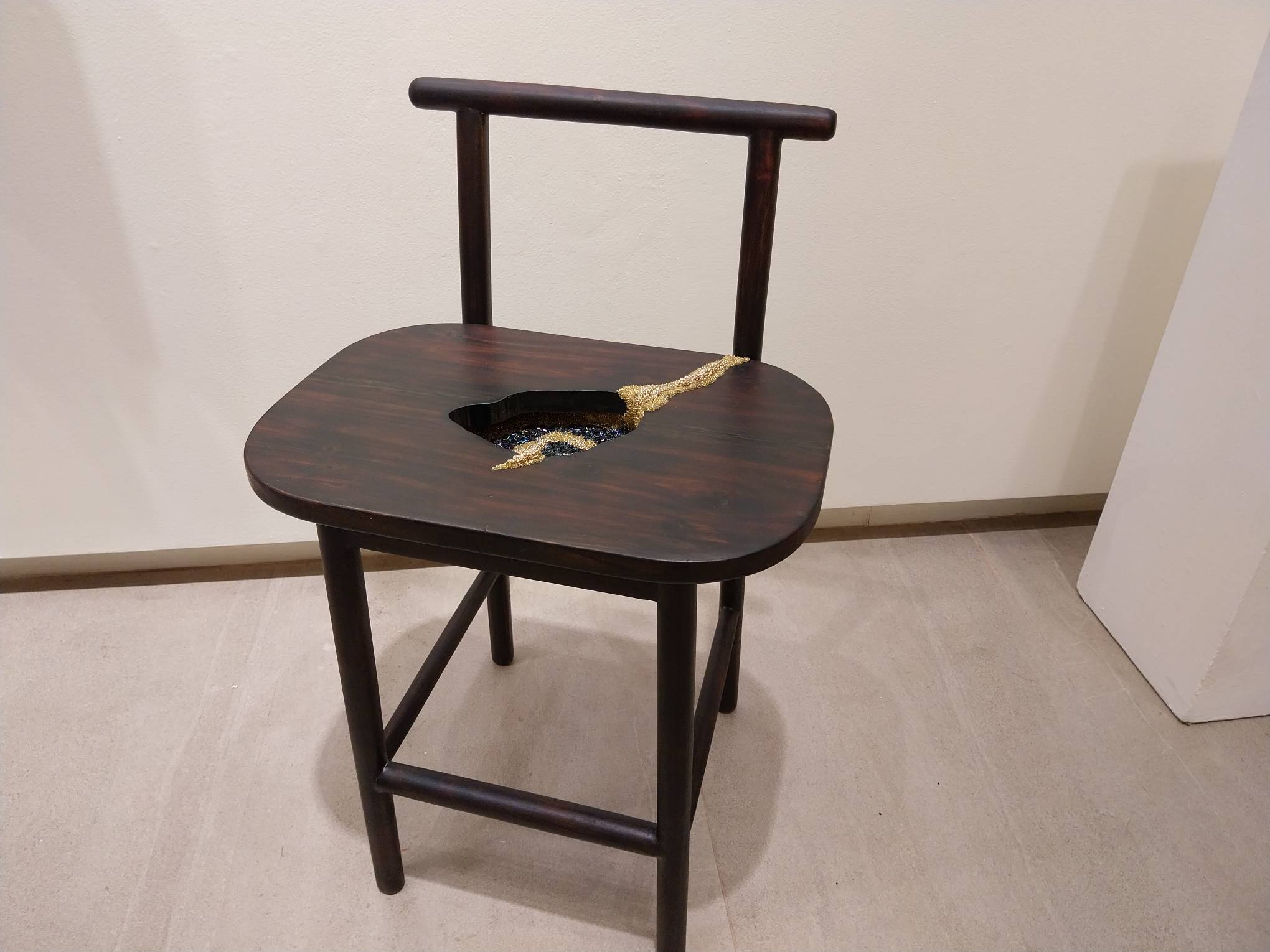 Faye Manalo's "Is This Seat Taken?" at her Art Anton exhibit. Photo by Elle Yap.