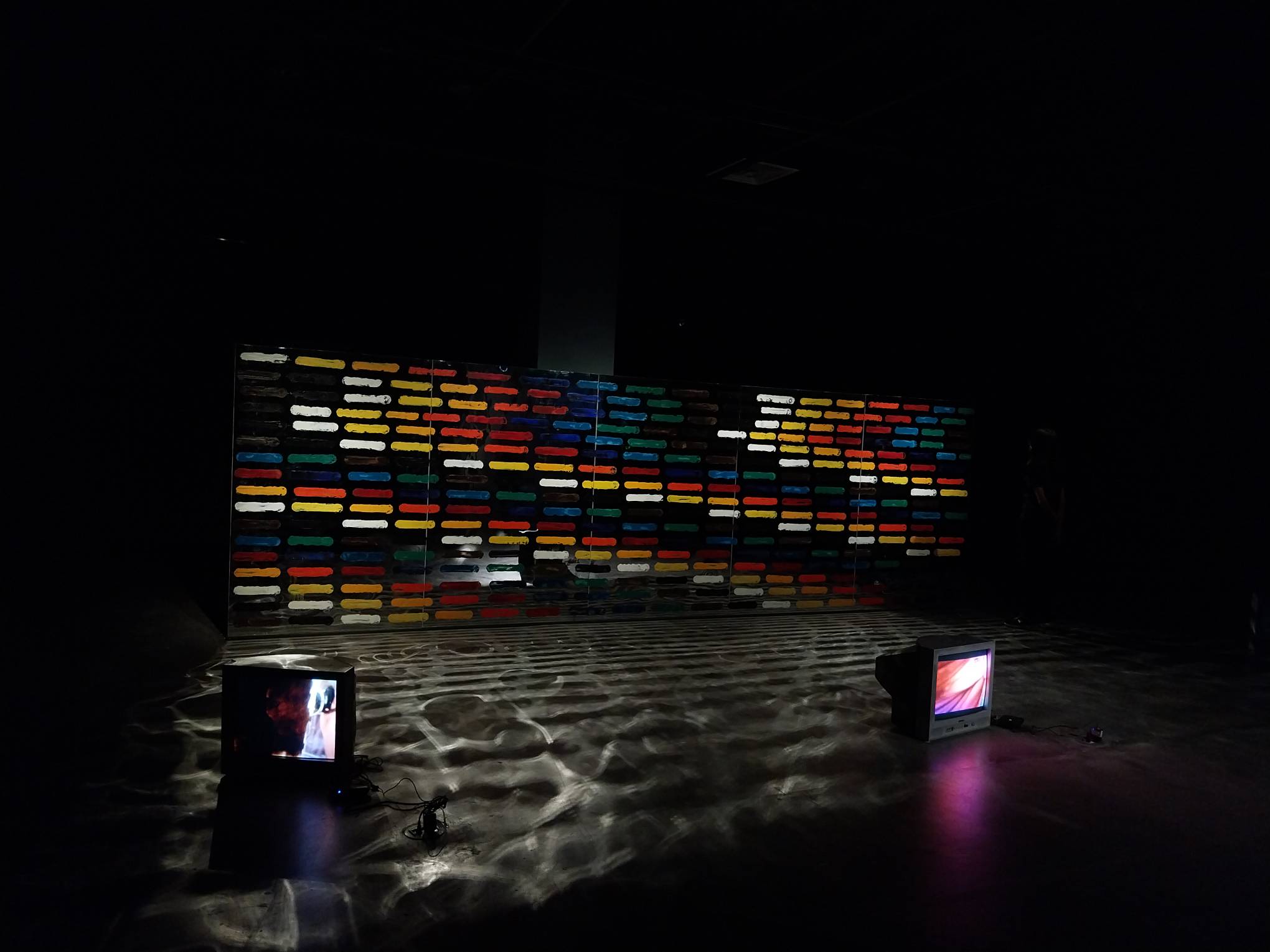 Gerardo Tan’s “Mirror Painting” for the Ateneo Art Gallery exhibit "Transitions and Continuity." Photo by Patricia Yap.