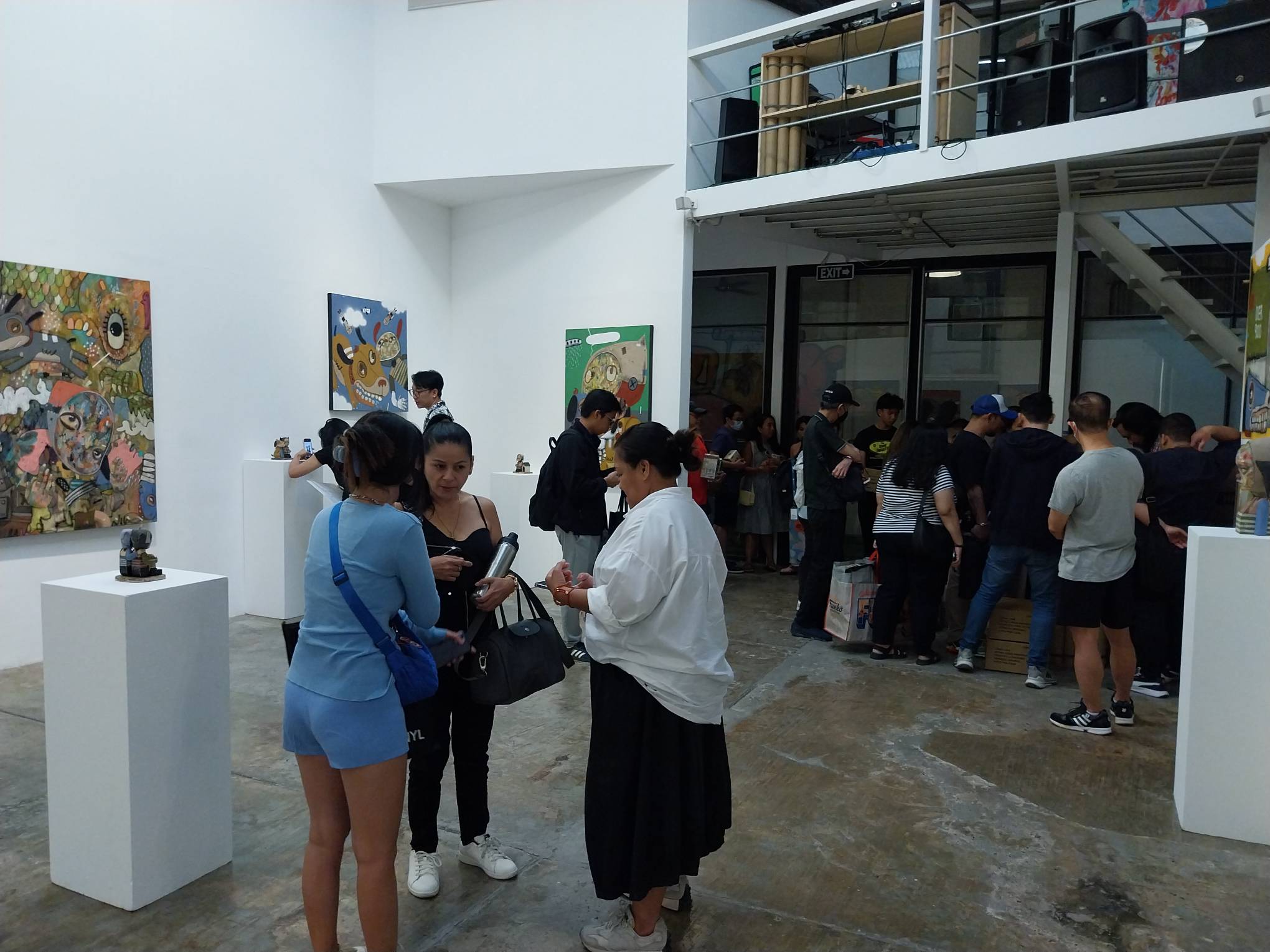 Vinyl on Vinyl's gallery opening for its four new exhibits. Photo by Elle Yap.