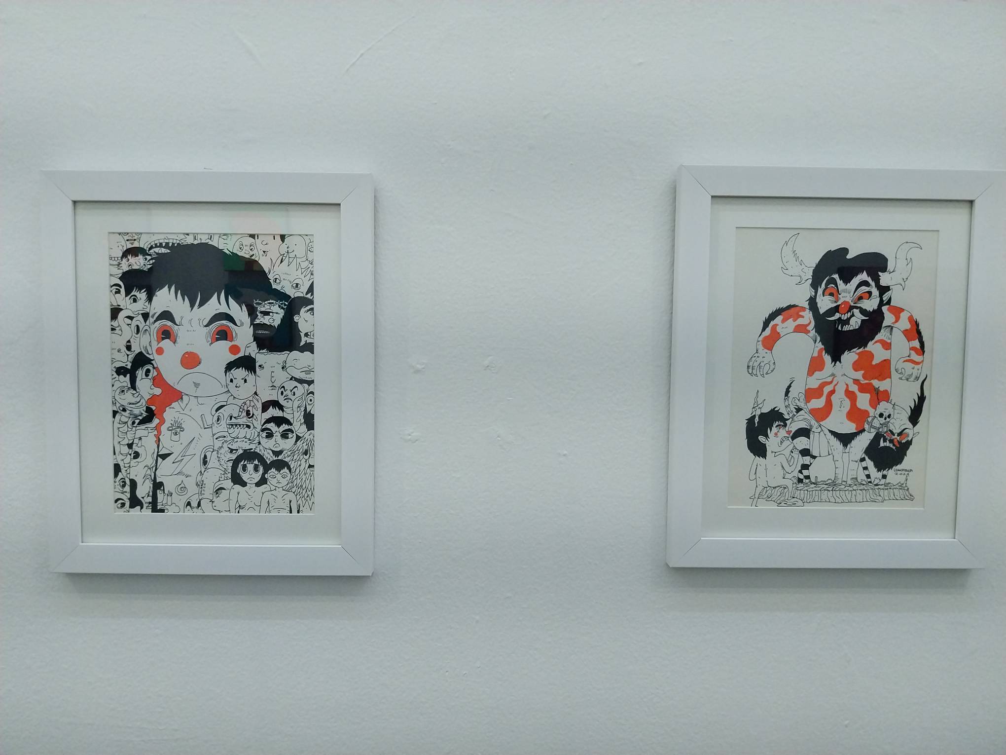 Two sketches by Leanderthal at Vinyl on Vinyl. Photo by Elle Yap.
