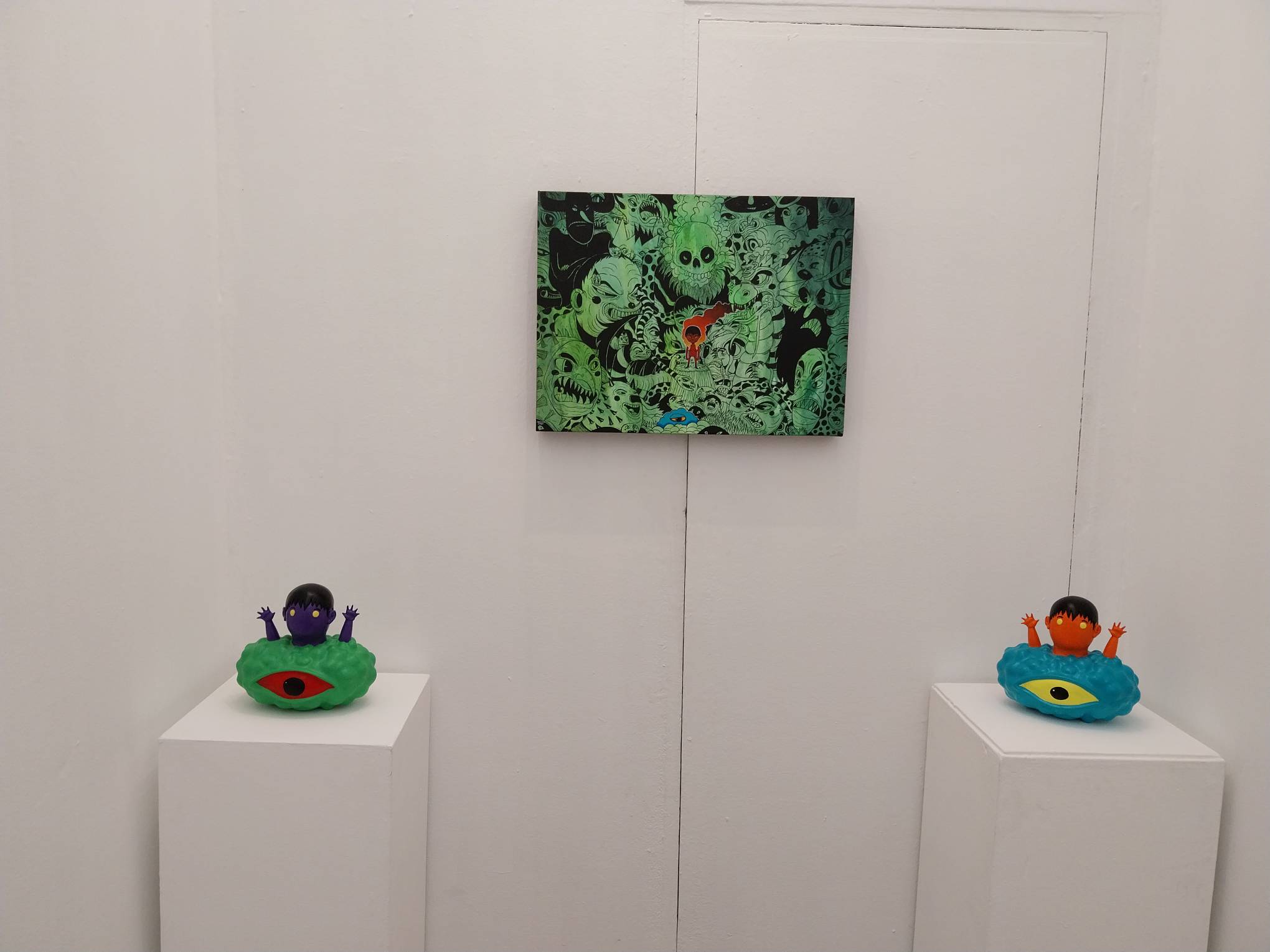 Three works by Leanderthal. Photo by Elle Yap.