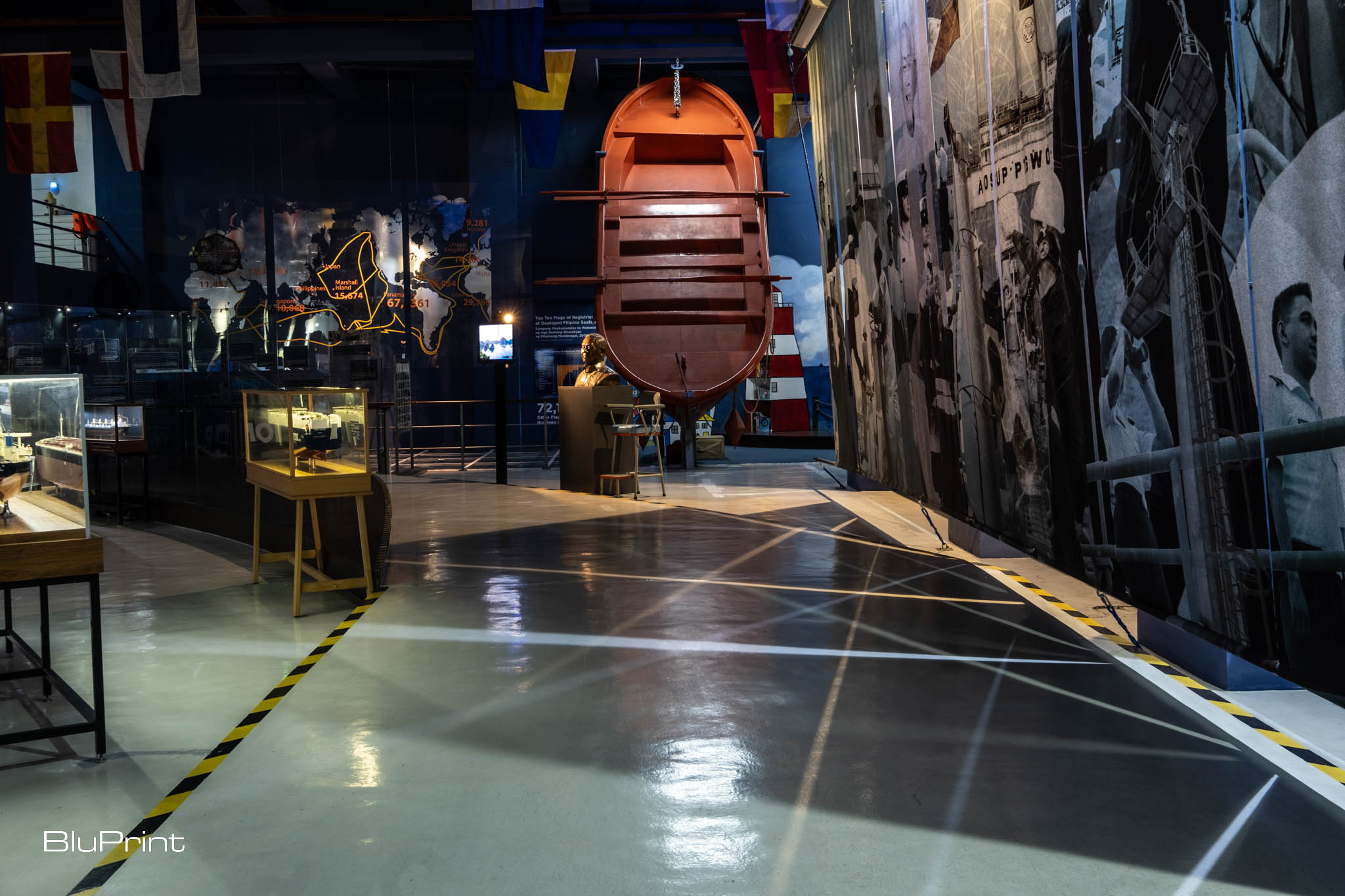 A vibrant boat hull serves as the museum’s centerpiece, guiding visitors through an immersive maritime journey.