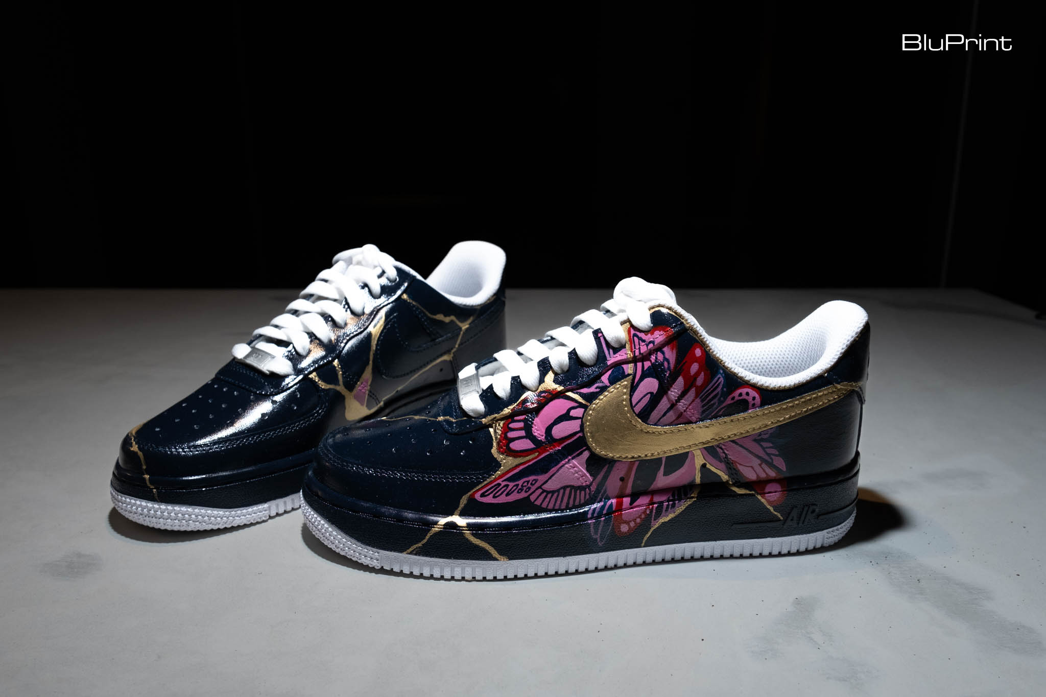 A pair of sneakers designed by artist Christina Dy for the Pink Room.