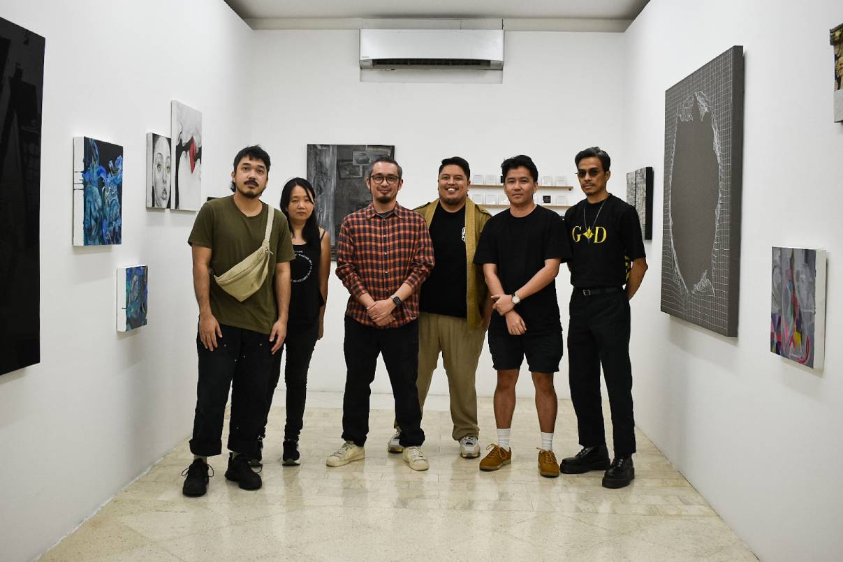 Six of the artists who contributed to 