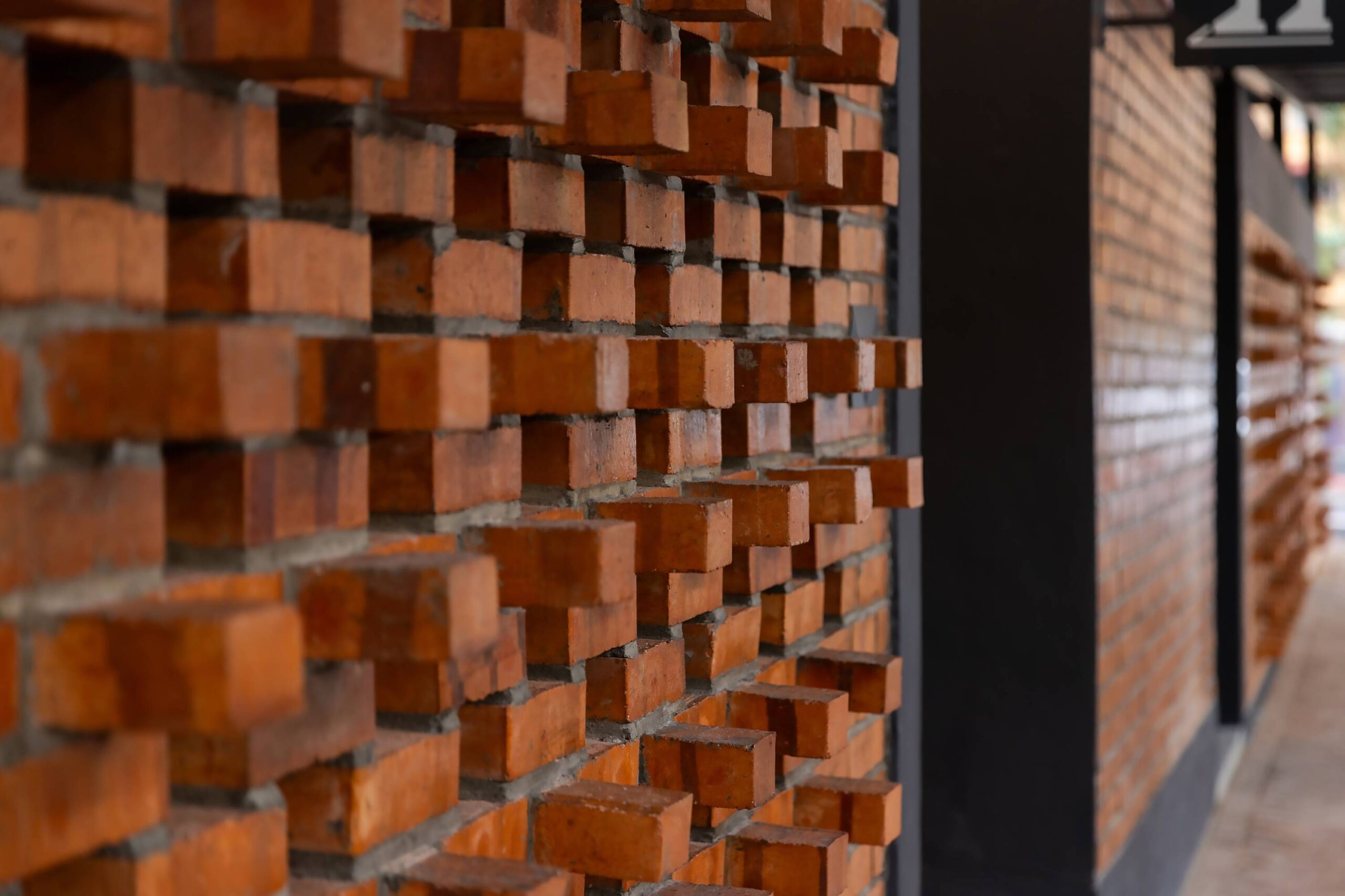 The brick facade of the communal areas. Photo by Pixelaw Photography.
