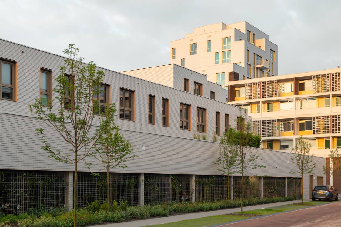 Back area of the three-storey building. Photo by Sebastian van Damme.