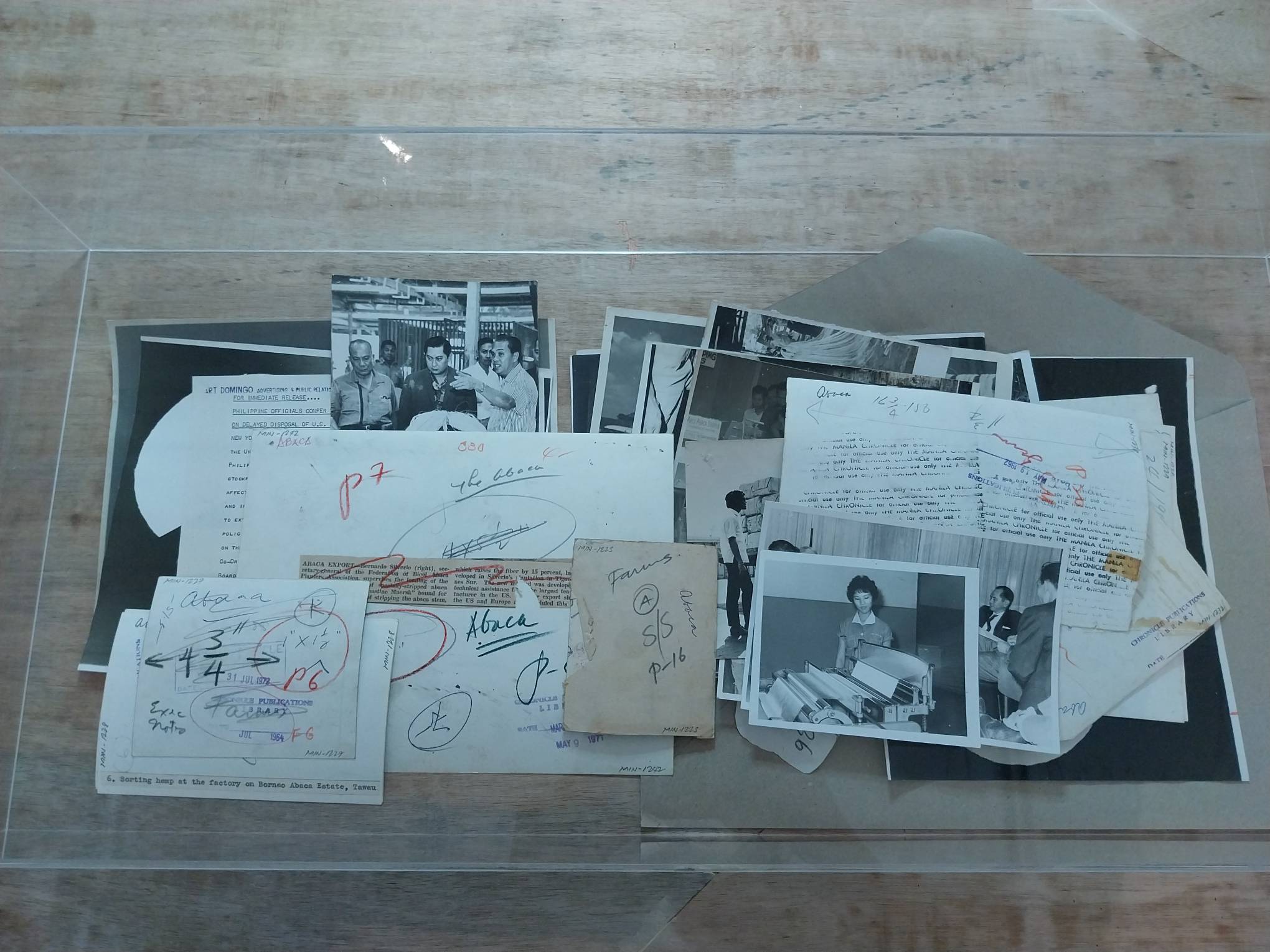 Box full of photographs for archiving. Photo by Elle Yap.