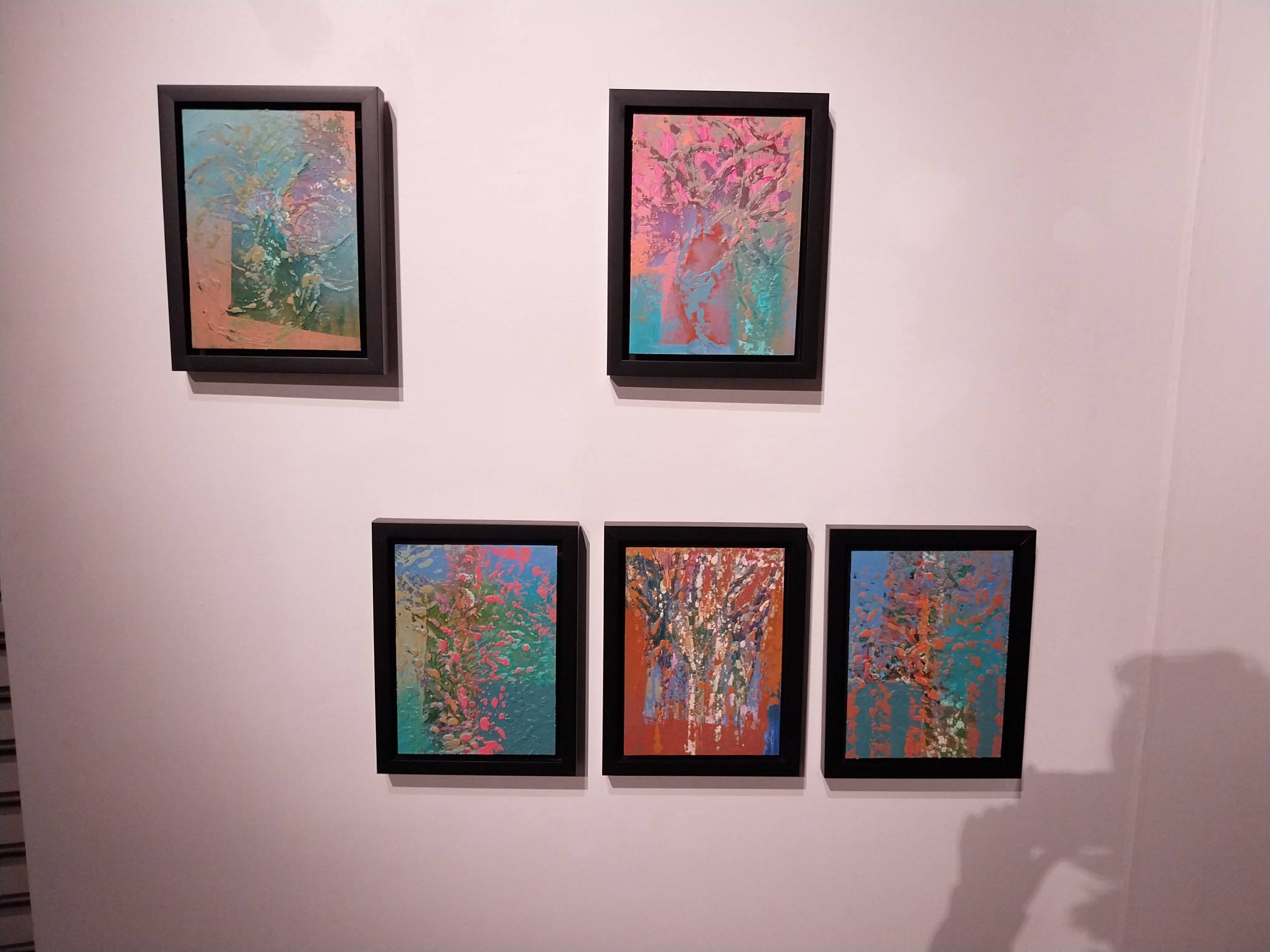 Five paintings for the Cabangis family's "Homemade" exhibit. Photo by Elle Yap.