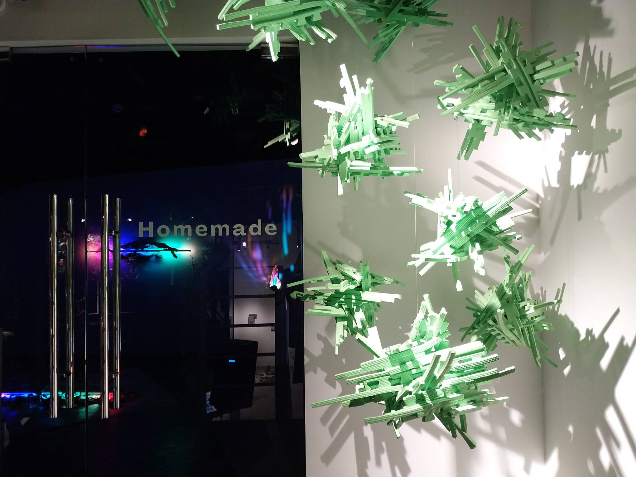 Foam works in front of a door that says "Homemade." Photo by Elle Yap.