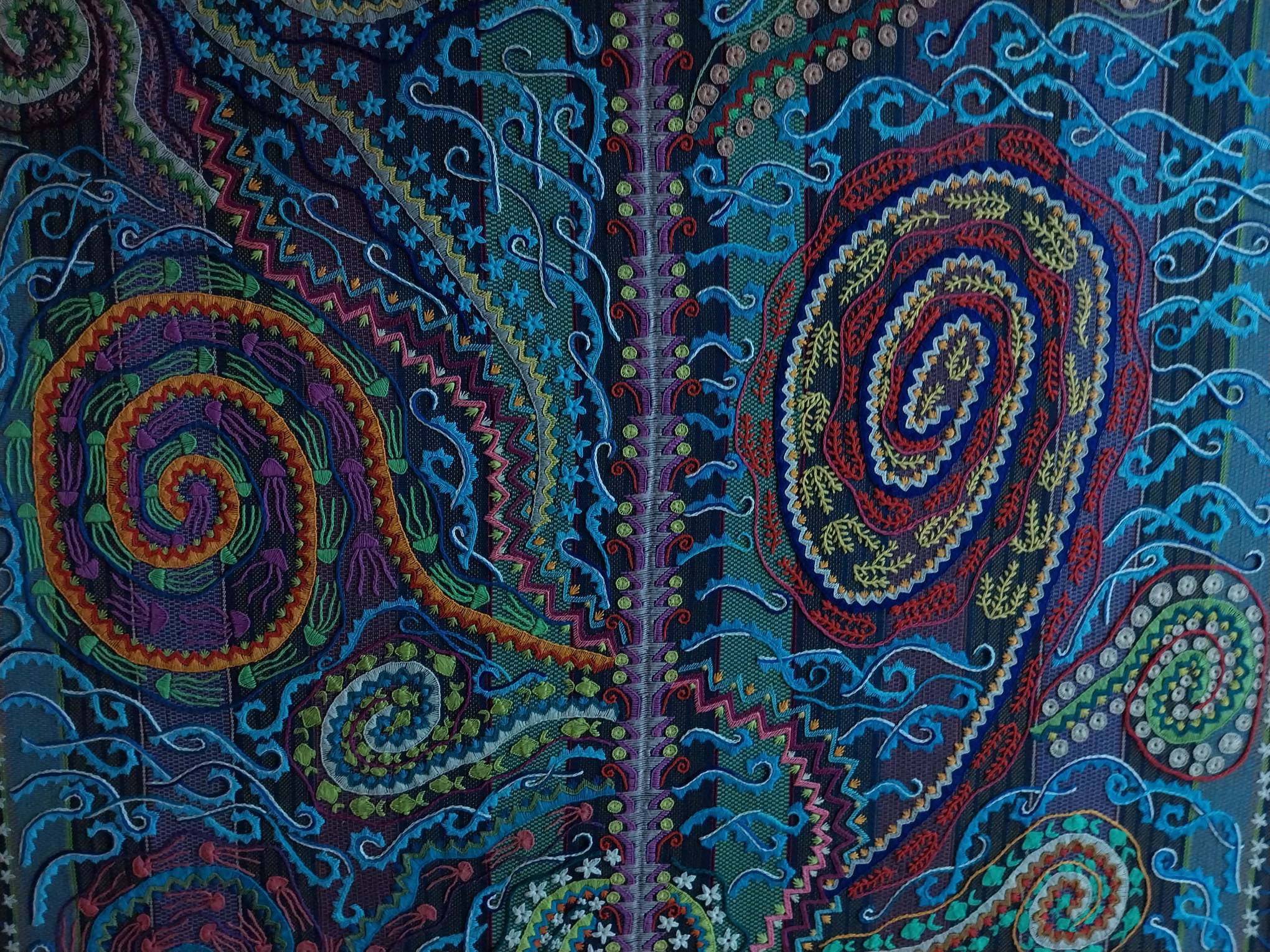 Close-up of a work shown at "The Heart of Every Mountain is Ocean."