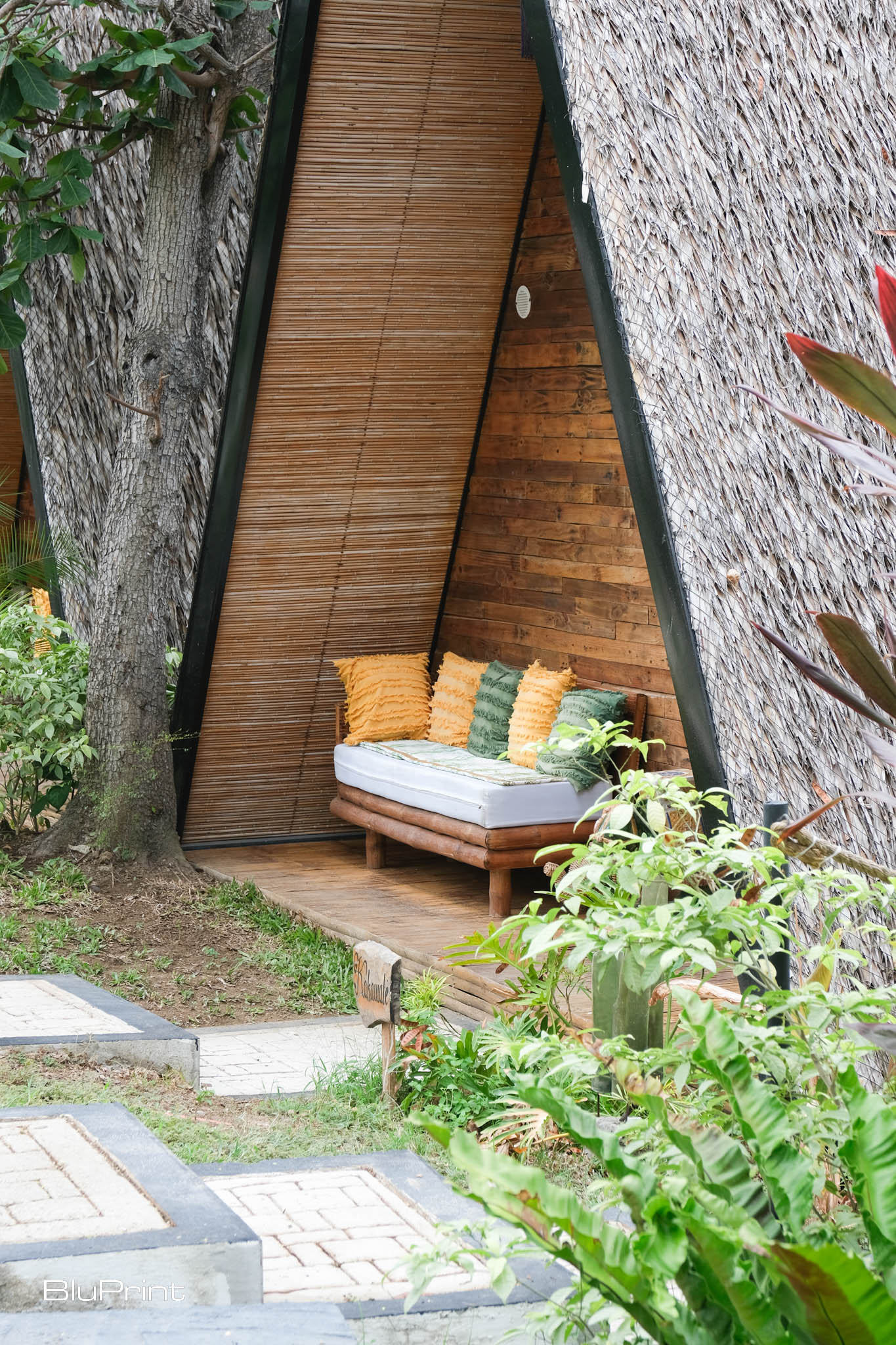 Teepee homes homes with thatched roofs at Nawa Wellness resort, designed by Tania Fricke Lichauco.