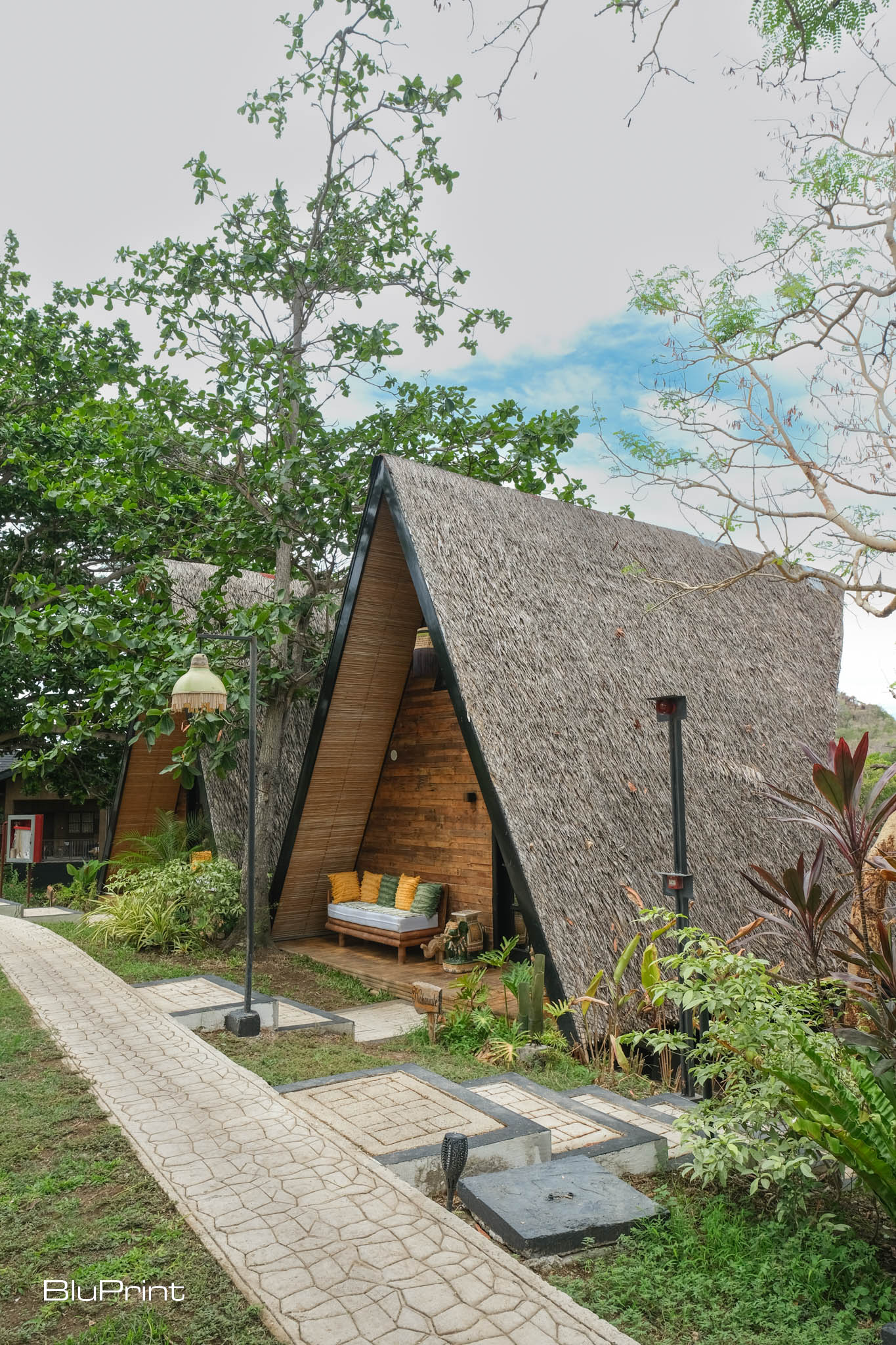 Teepee homes homes with thatched roofs at Nawa Wellness resort, designed by Tania Fricke Lichauco.