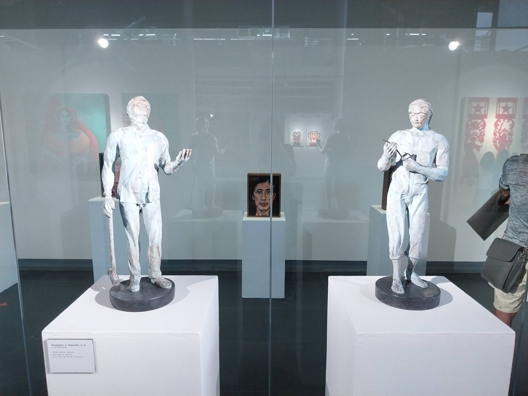 Two works by Lito Mondejar.