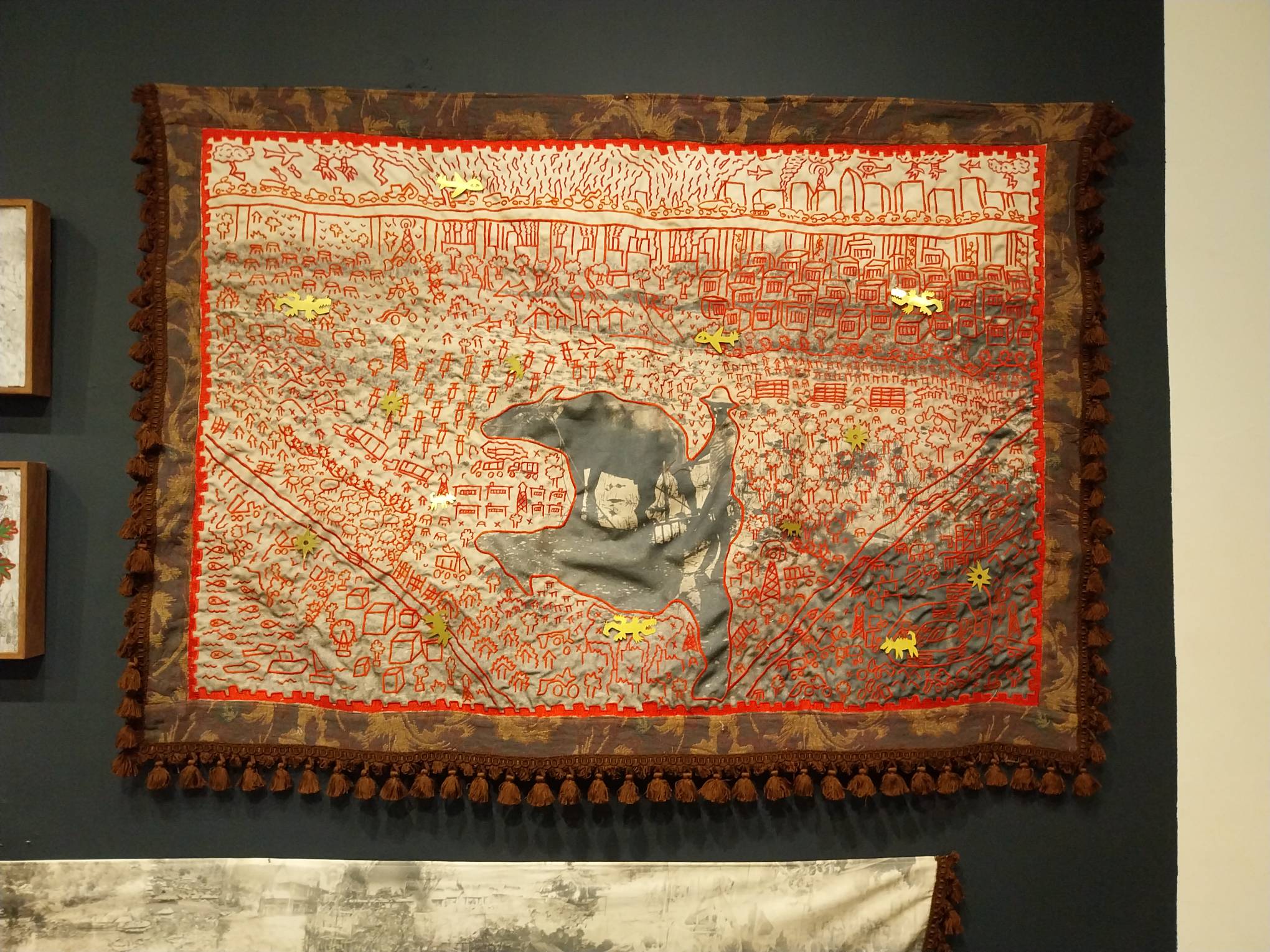 An emboridered work as shown in Crossing Rivers.