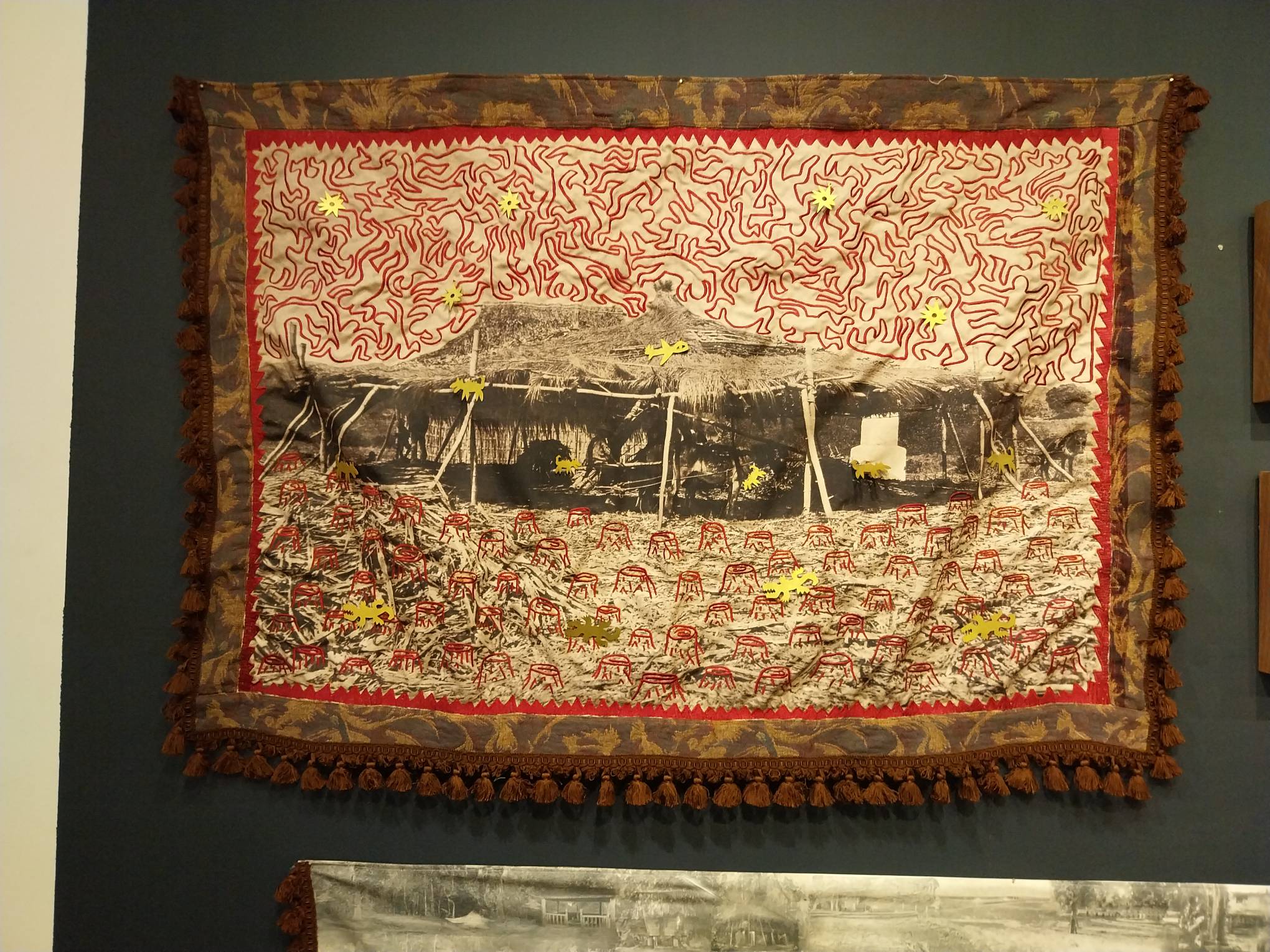 An emboridered work as shown in Crossing Rivers.