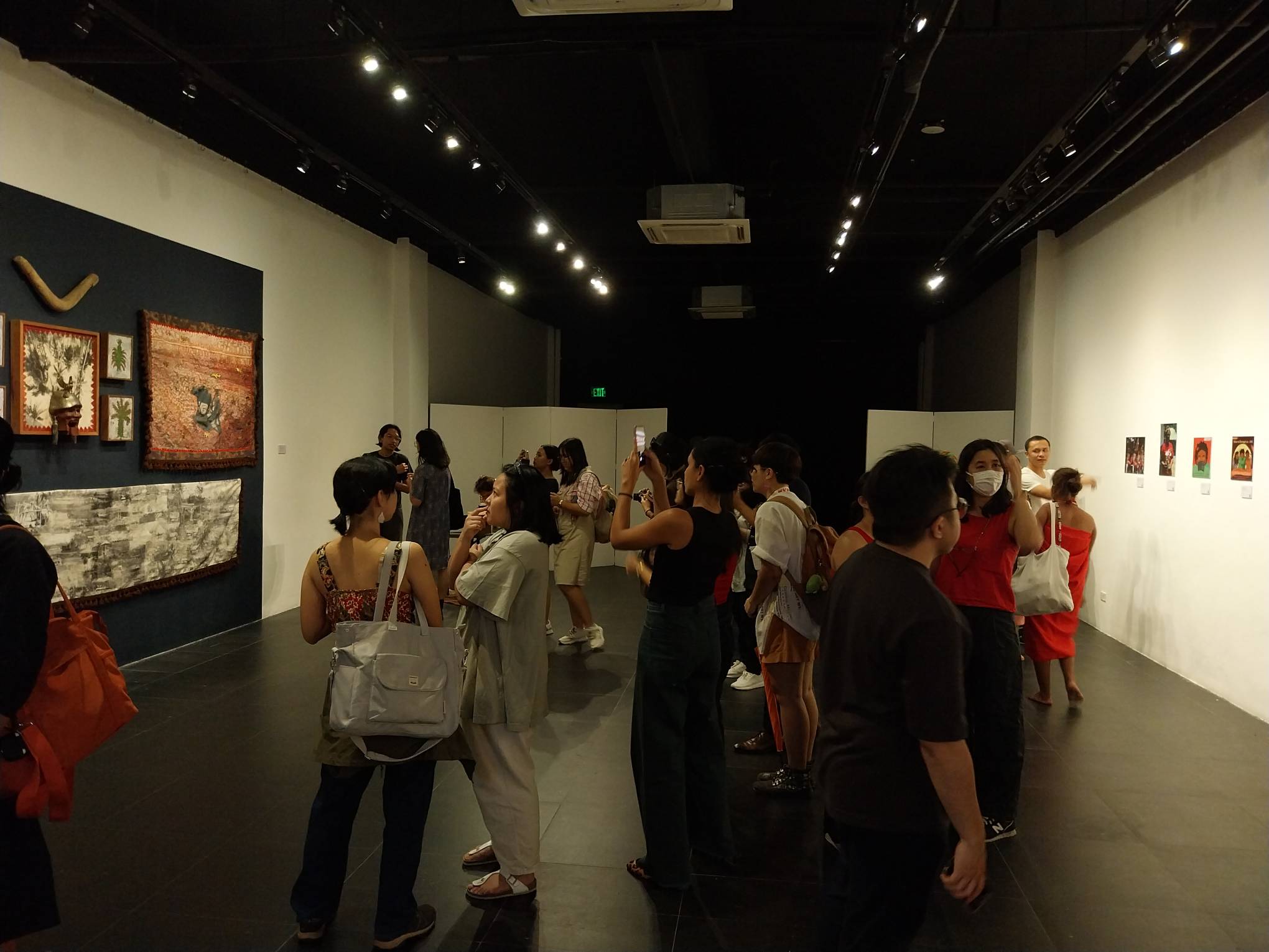 Attendees of the opening day of "Crossing Rivers."